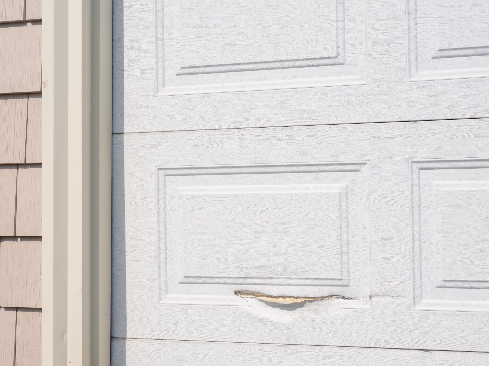 garage door with scar