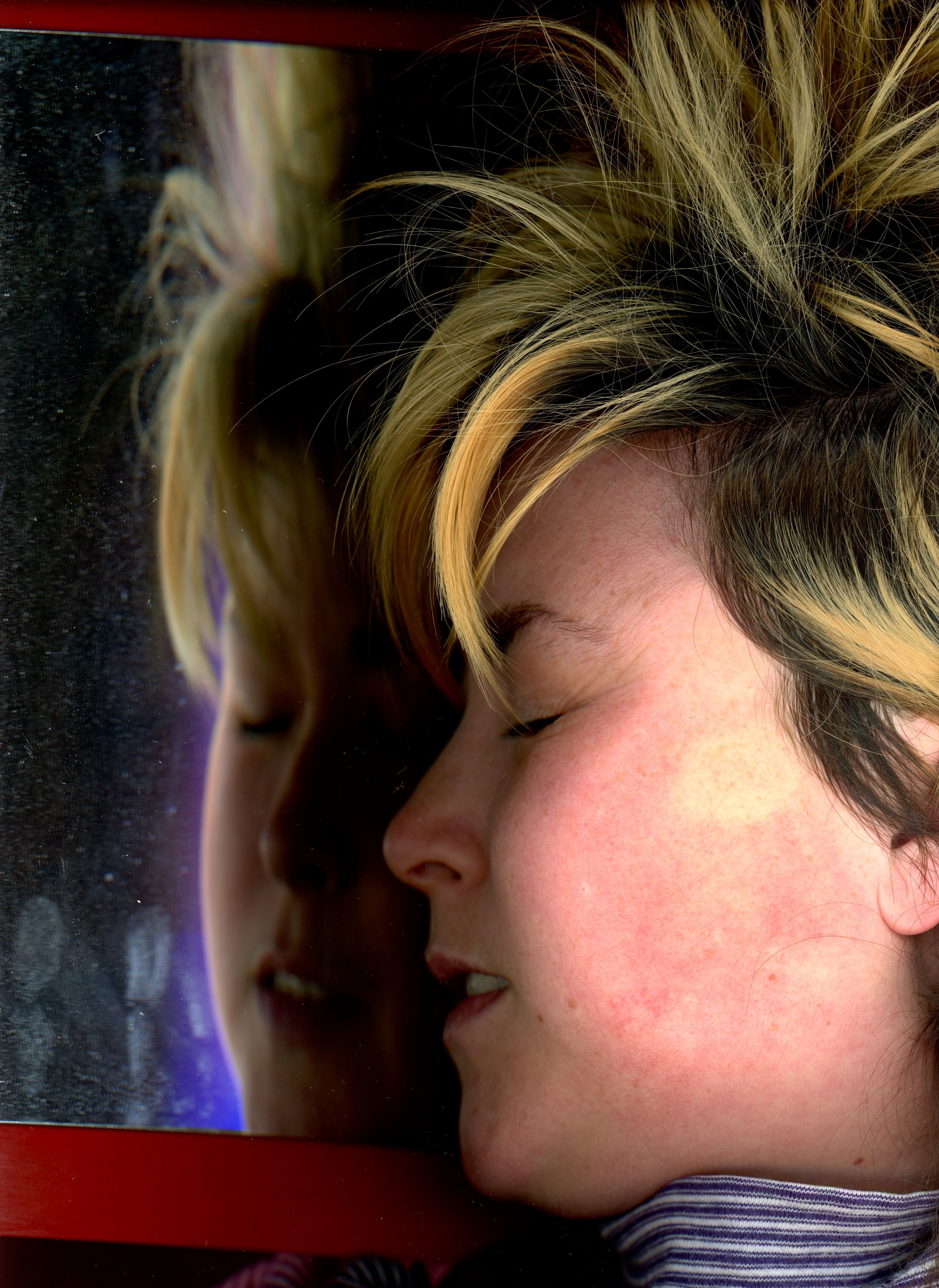Wedged between the Scanner and the Mirror