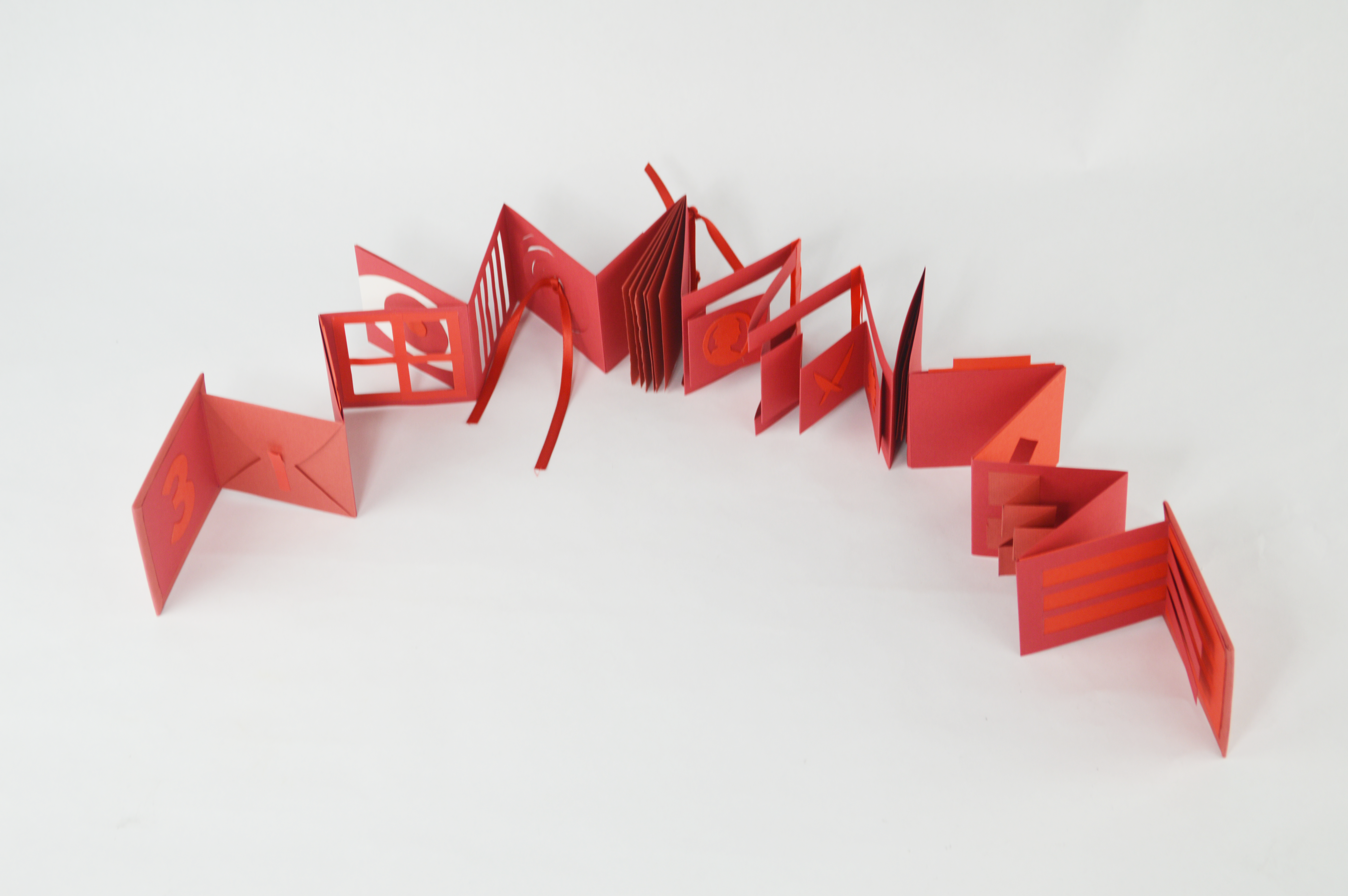 Folded red accordian paper