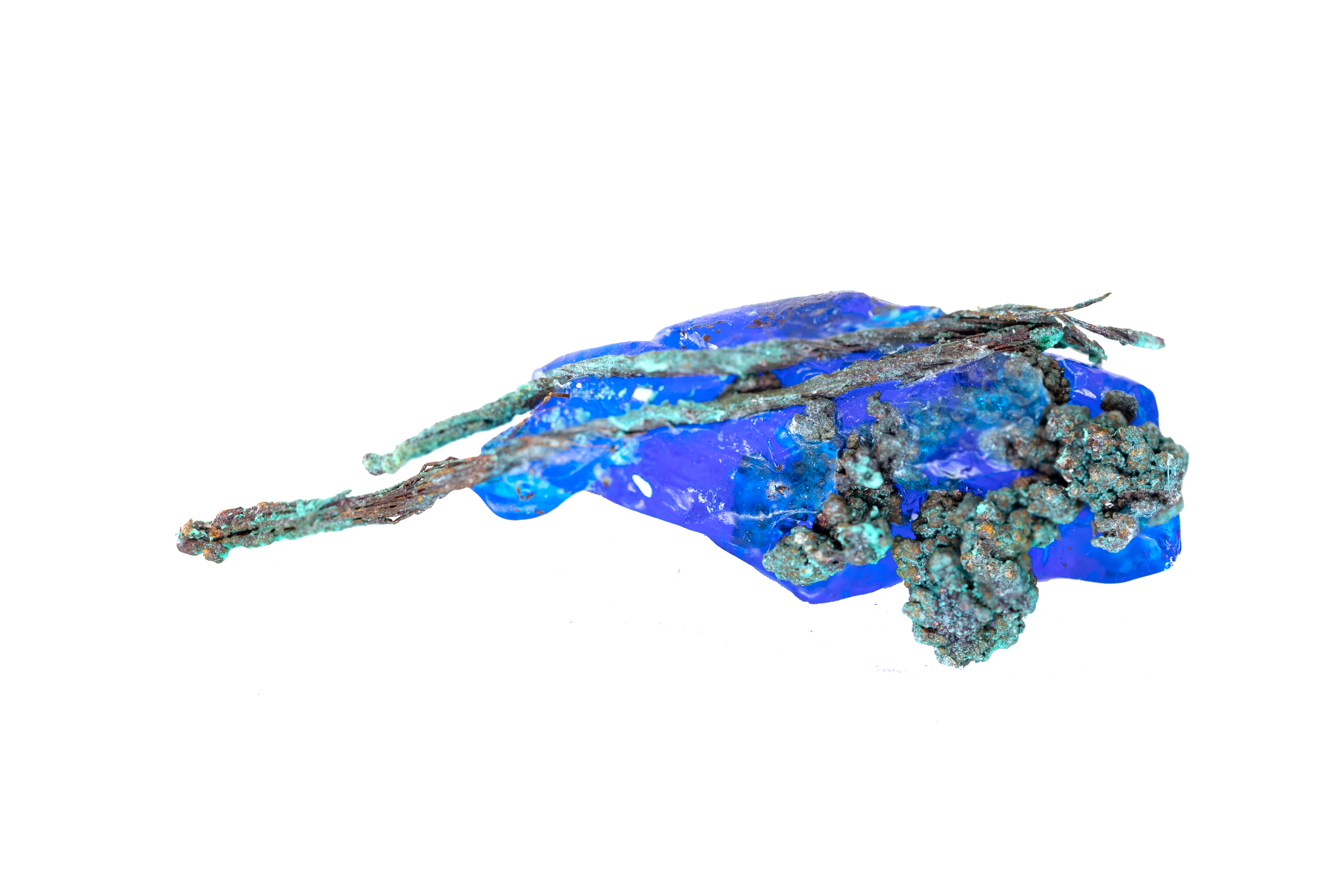 blue copper sulfate crystal with embedded copper wire
