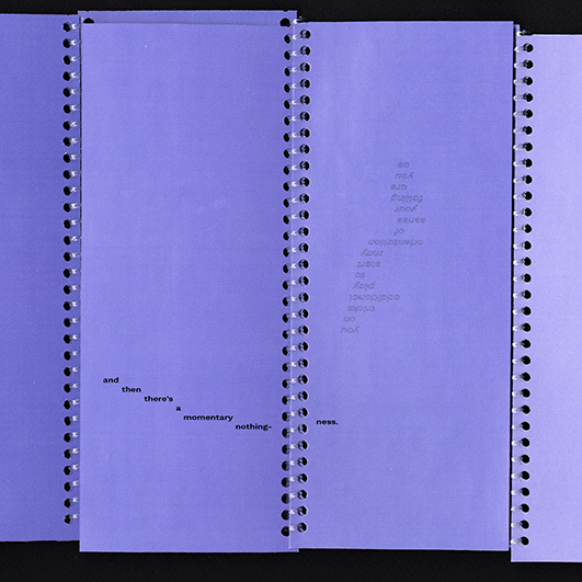 spiral bound tall and thin purple sheets with illegible text