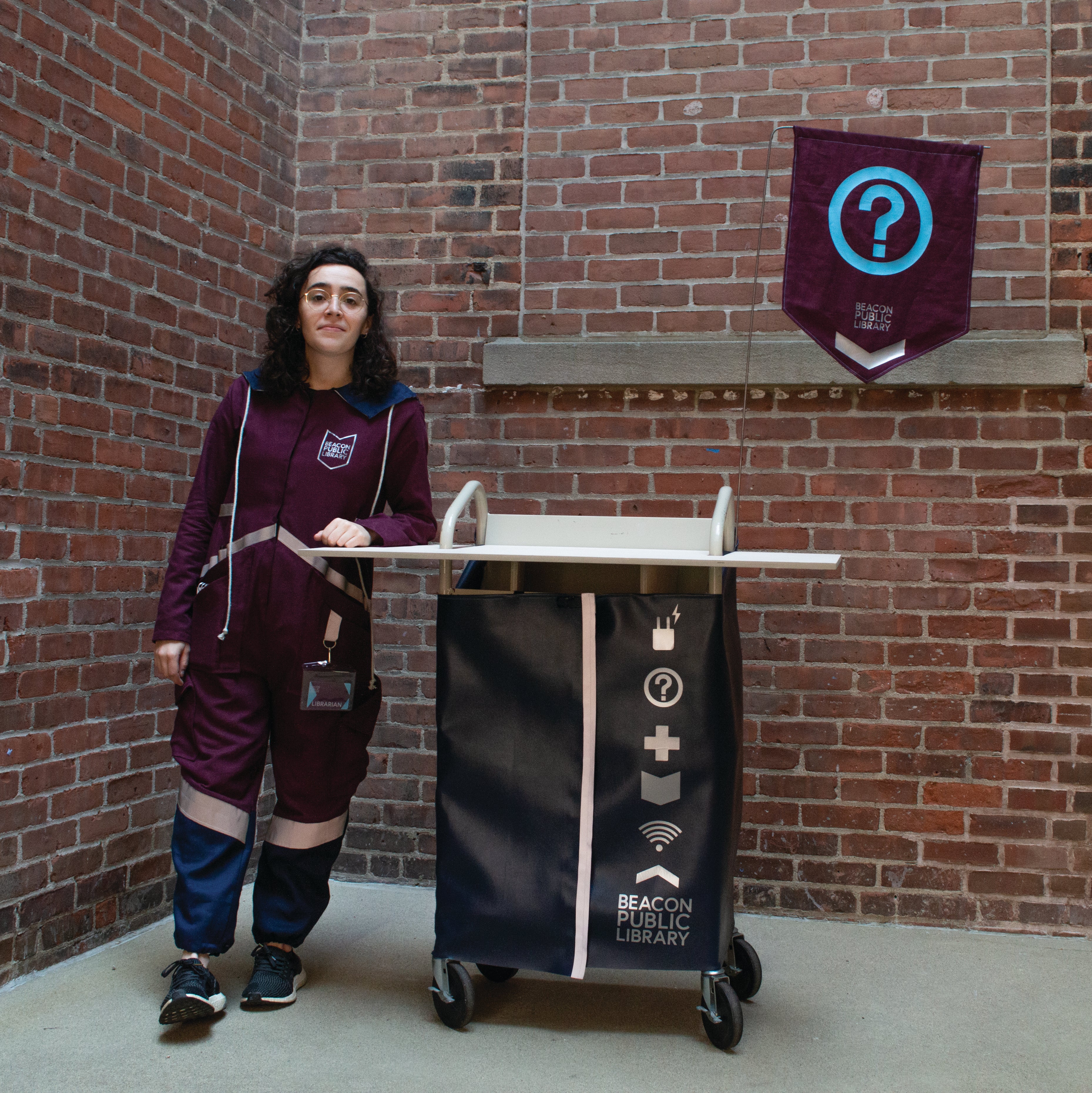 Library cart and librarian in uniform
