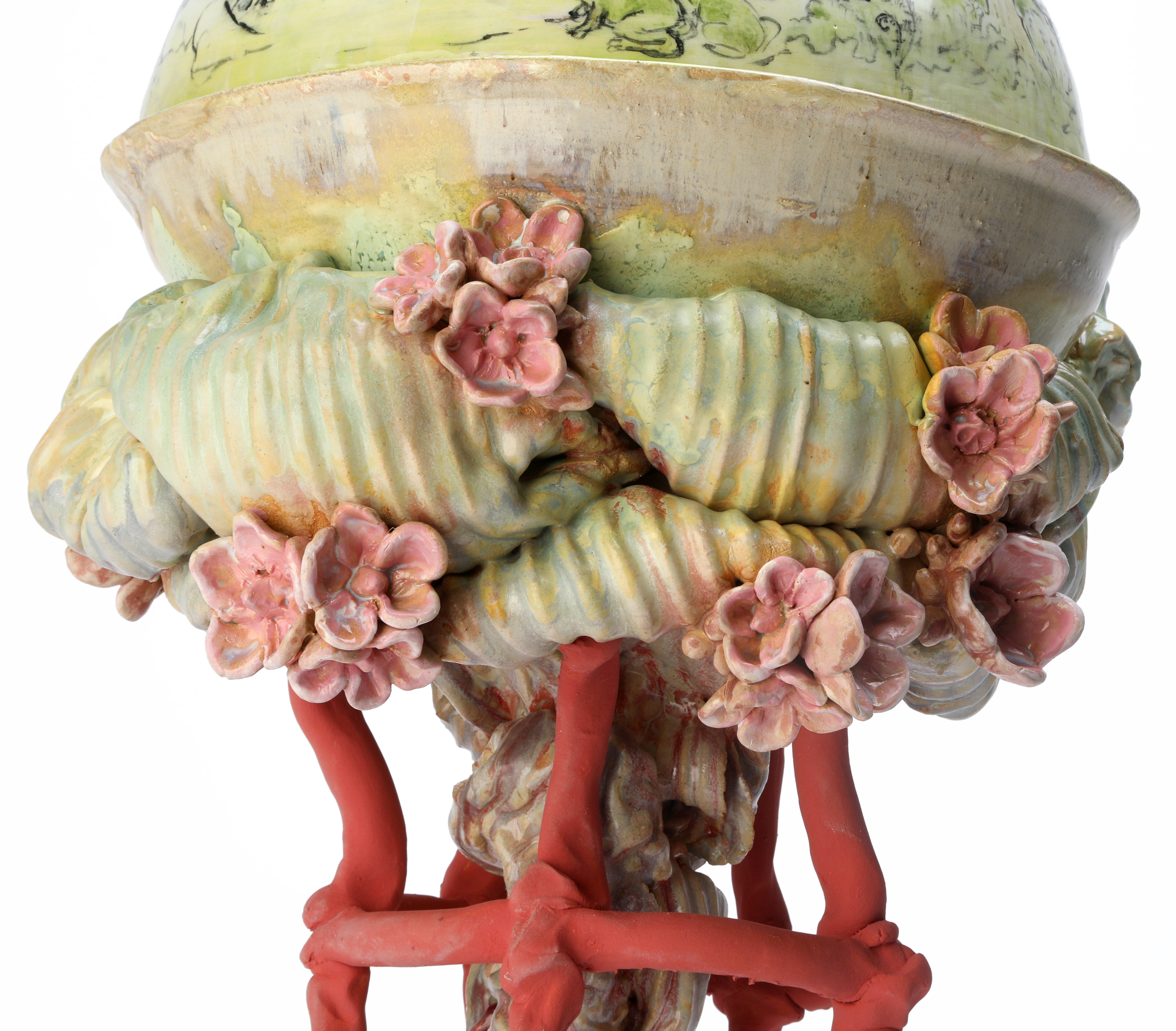 Close up of Spring Vessel with ceramic flowers errupting from vessel. 