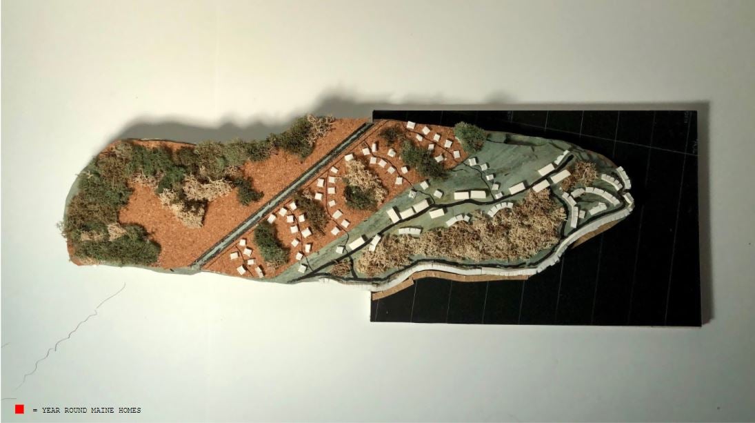 A regional model of year round Maine homes on the coastline.