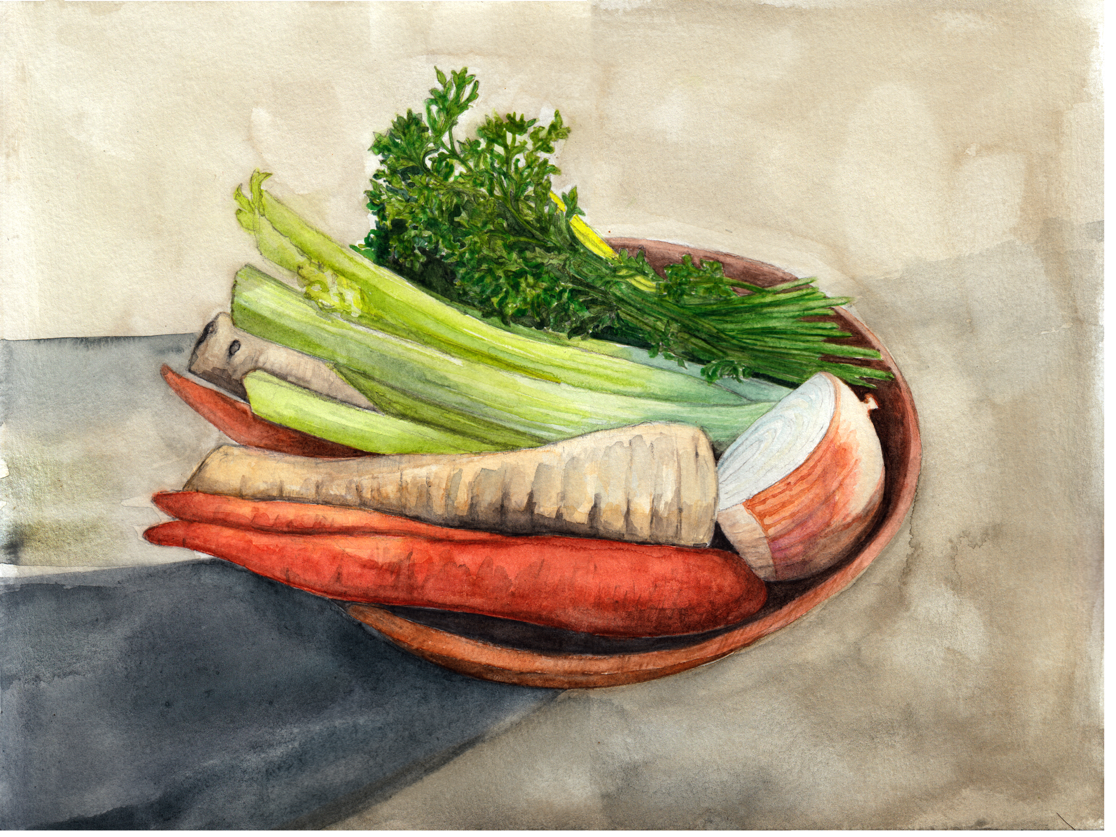 A wooden bowl of carrots, celery, parsley, parsnip, and onion