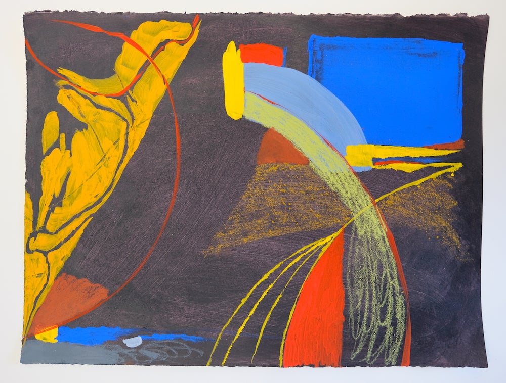 Photo of an abstract drawing in primary colors on grey 