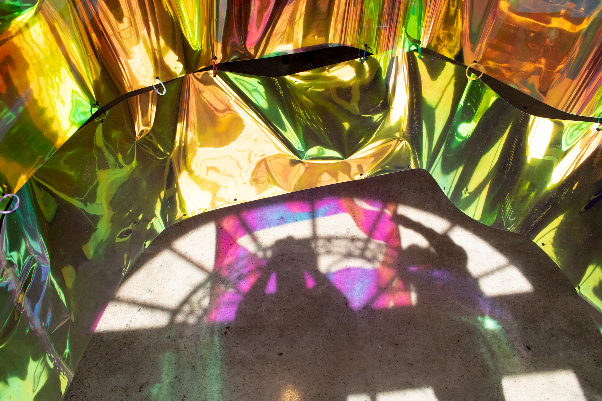 An image of a reflection of the iridescent space. 