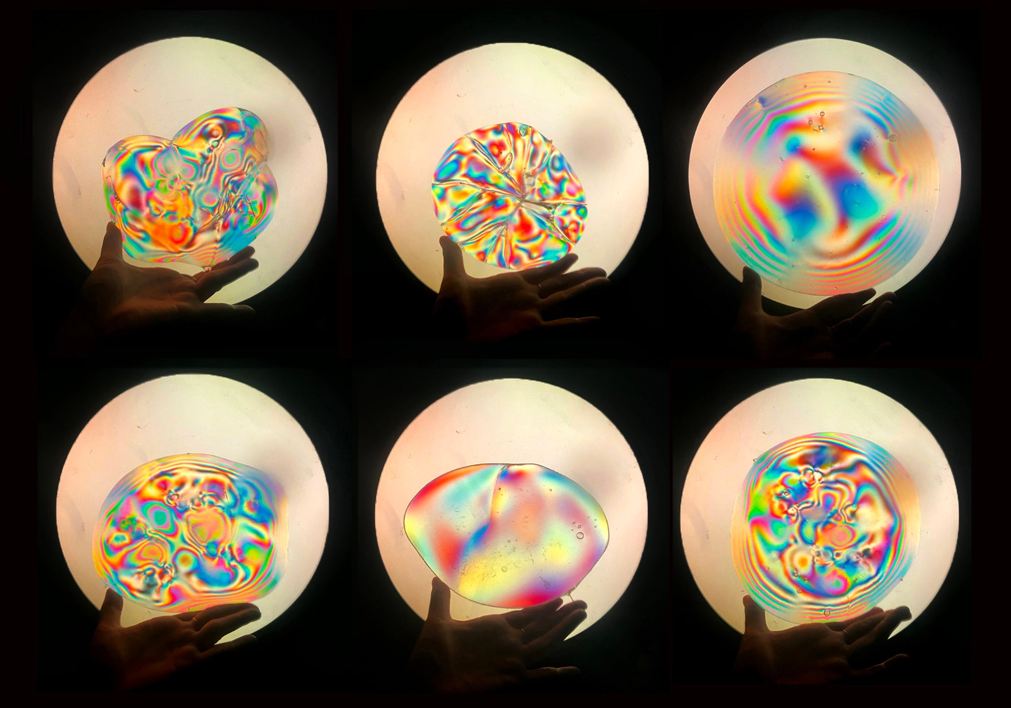Observing stressed glass pieces through a polariscope.