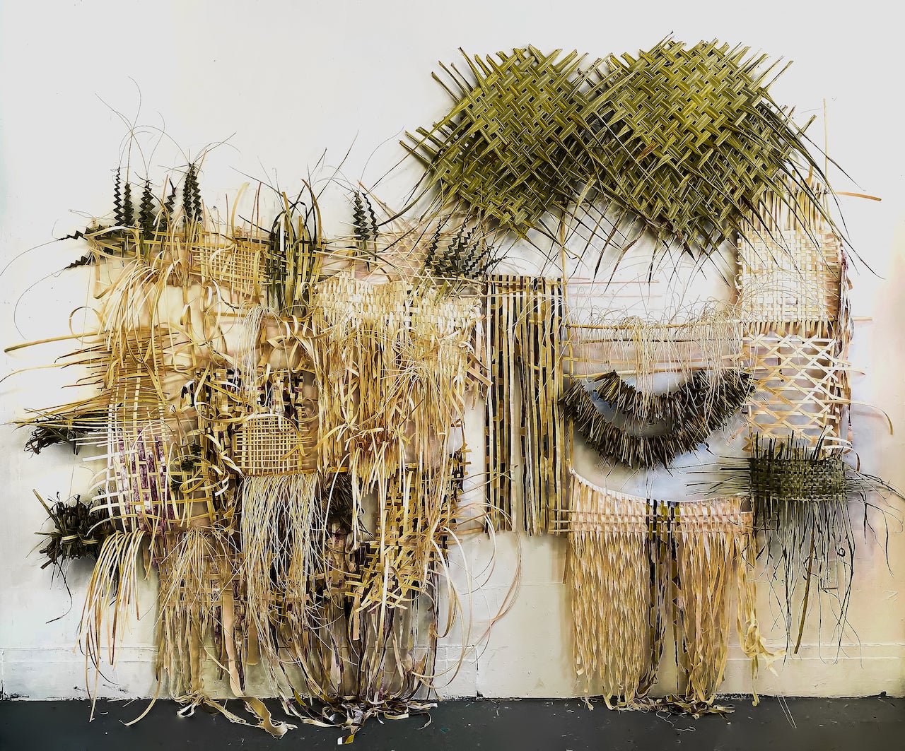Finding ways to demonstrate other forms of "banig" (traditional Filipino woven mats) In the language of paintings, I let each of the tendrils loose and not secured in the matrix of the weaving to represent paint drips.