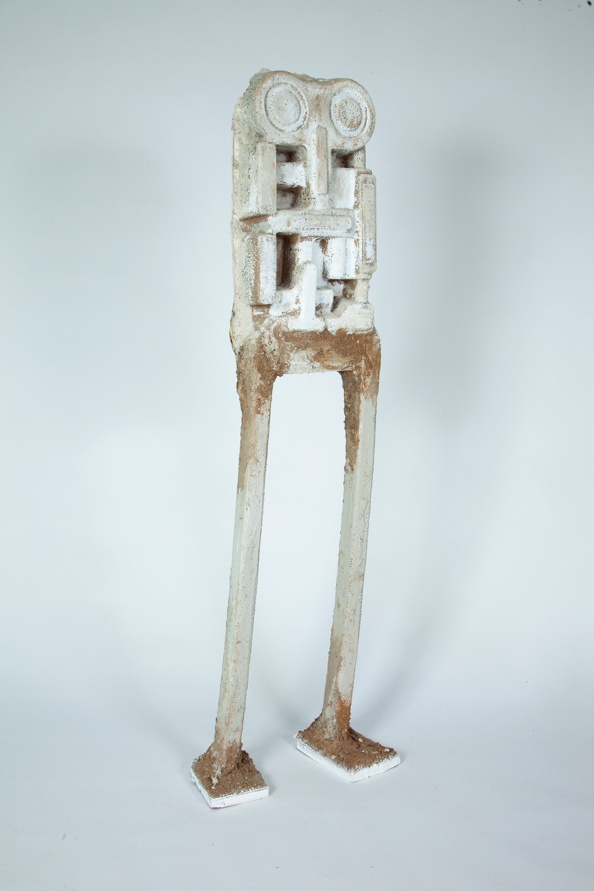 tall figure with cardboard head and torso