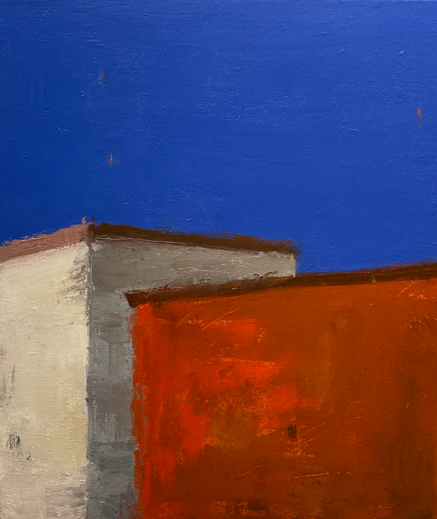 Two buildings that are large blocks of color, left is cream, right is a fire orange, very blue sky. 