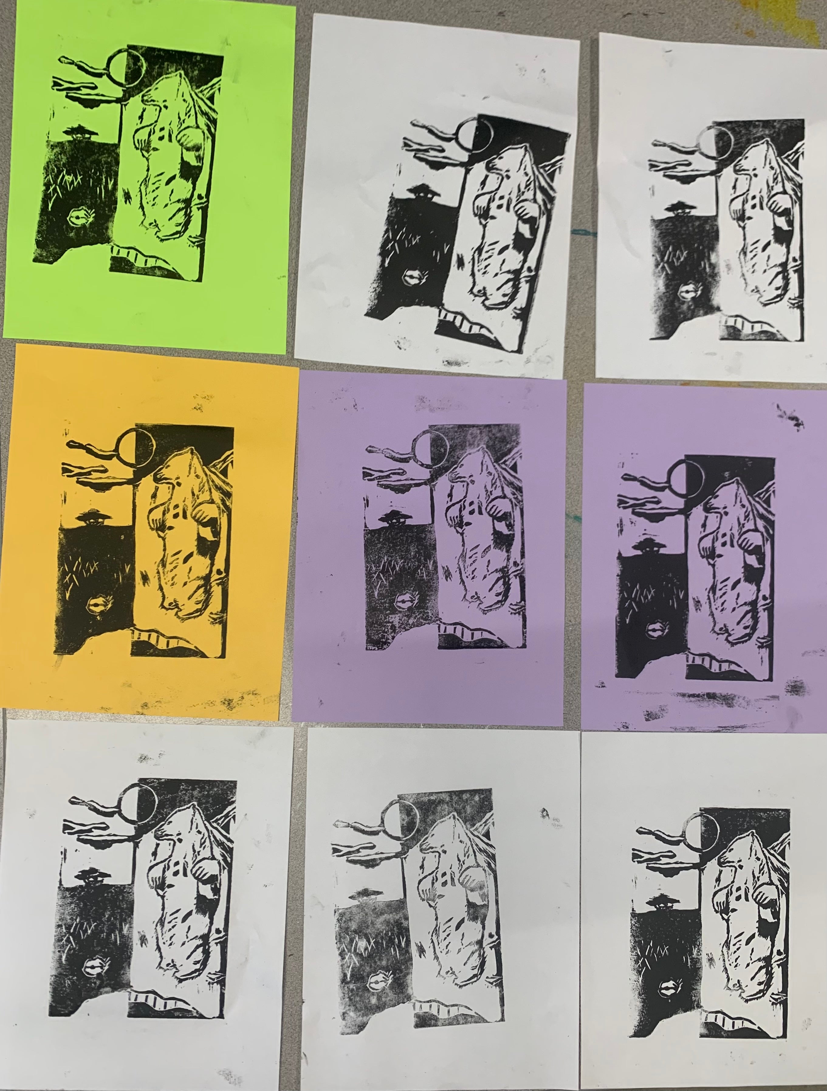 Various colored linocut blocks that have animals on them