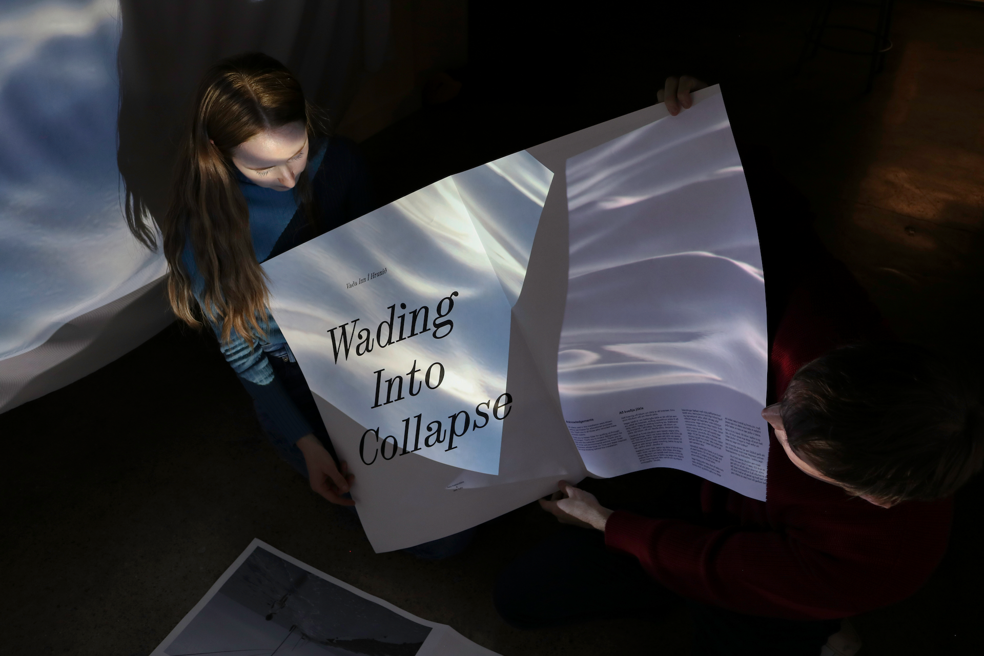 A projection of a video overlaid on a publication. 