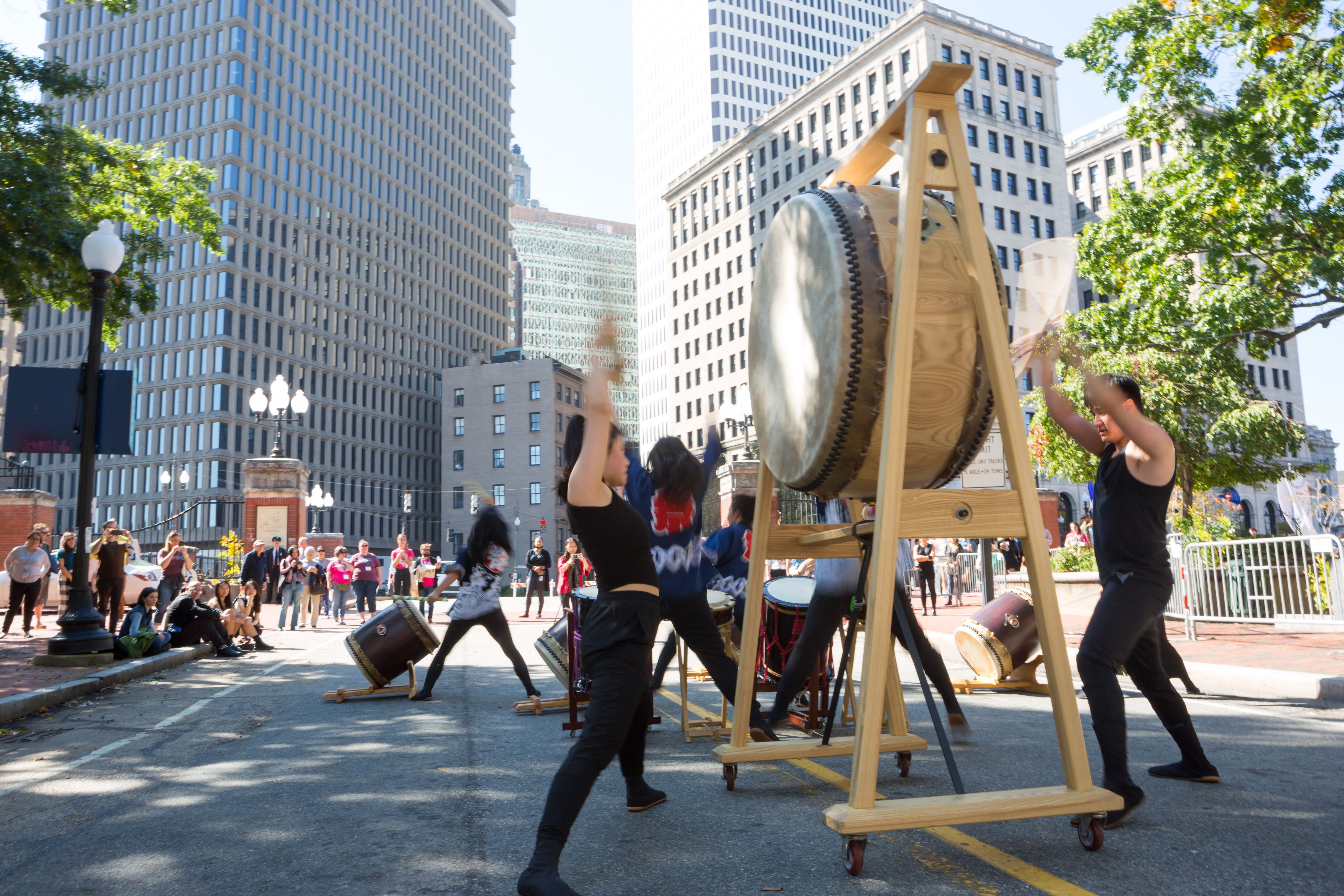 /RISD/Brown%27s%20Japanese%20drumming%20group%2C%20Gendo%20Taiko%2C%20performs%20on%20the%20street%20in%20downtown%20Providence%20by%20the%20College%20Street%20bridge.
