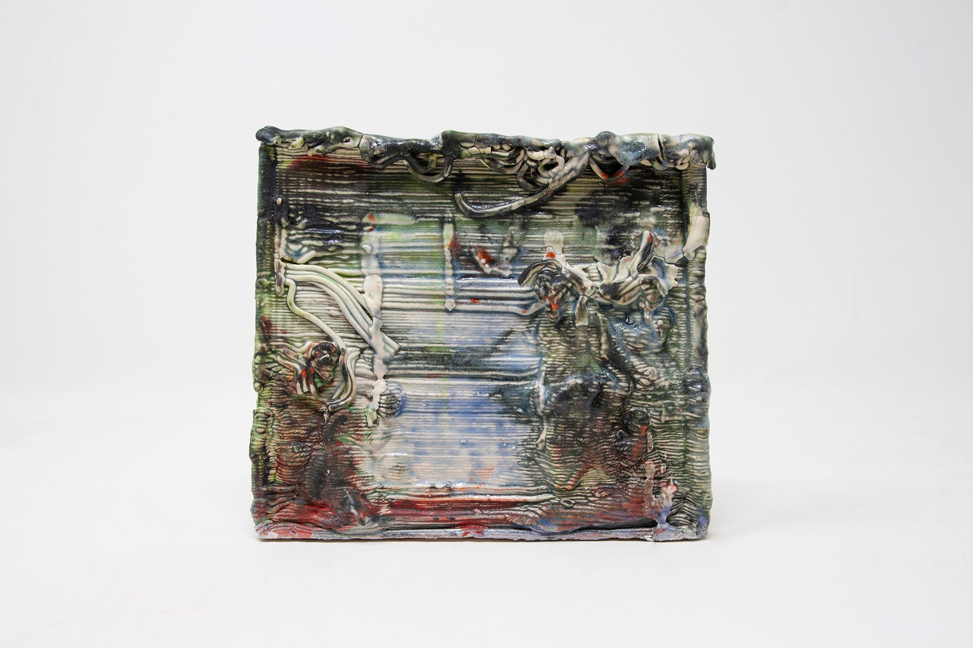 Blue, green, and red glazed ceramic tile scene of 5 abstract figures