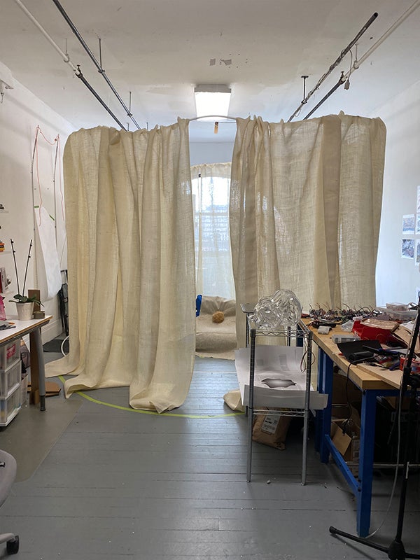 Hanging panels of burlap fabric in a circle formation