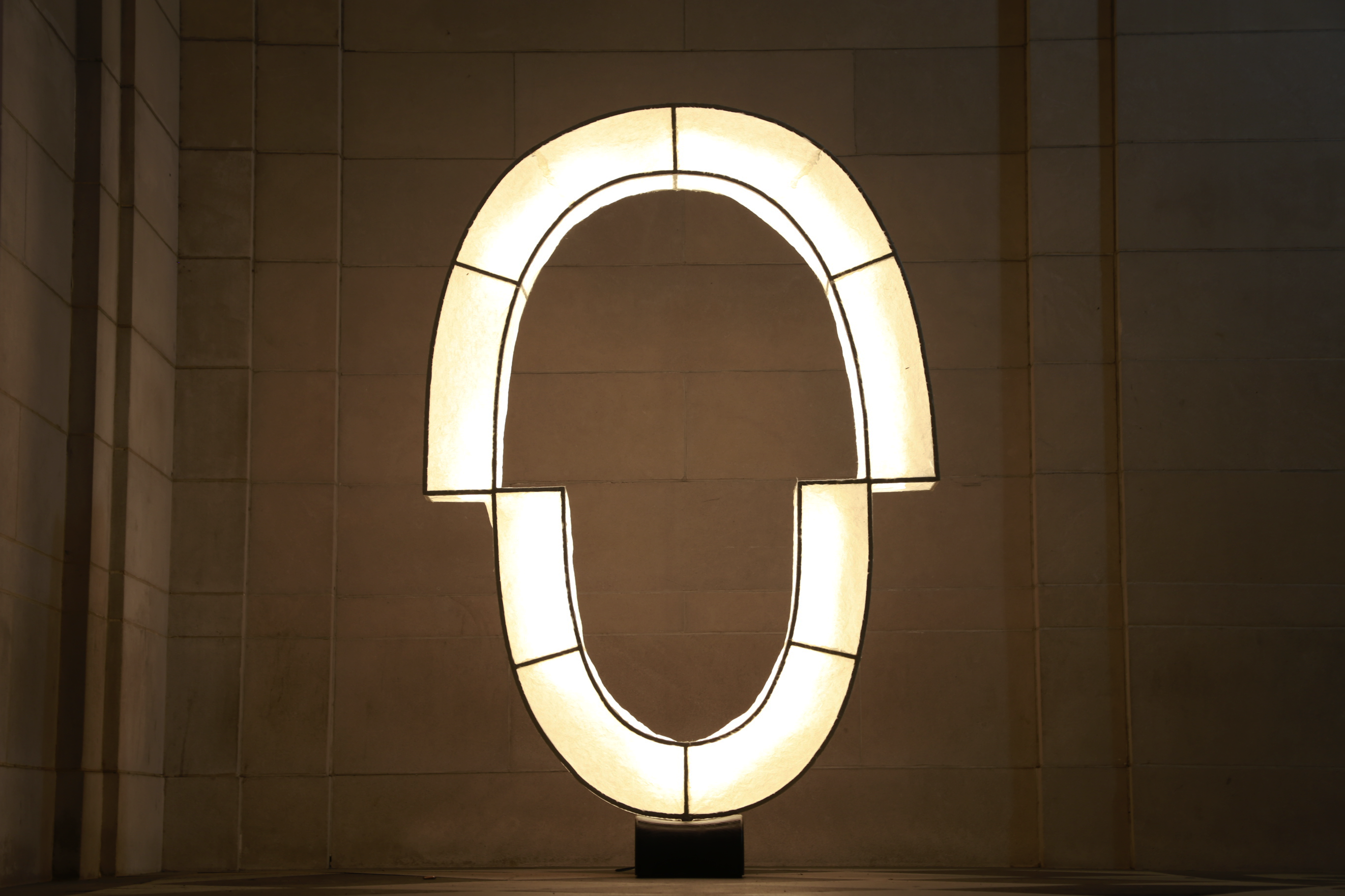 Kozo paper floor lamp with stone background