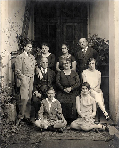 Black and white photograph of a family of 9 people
