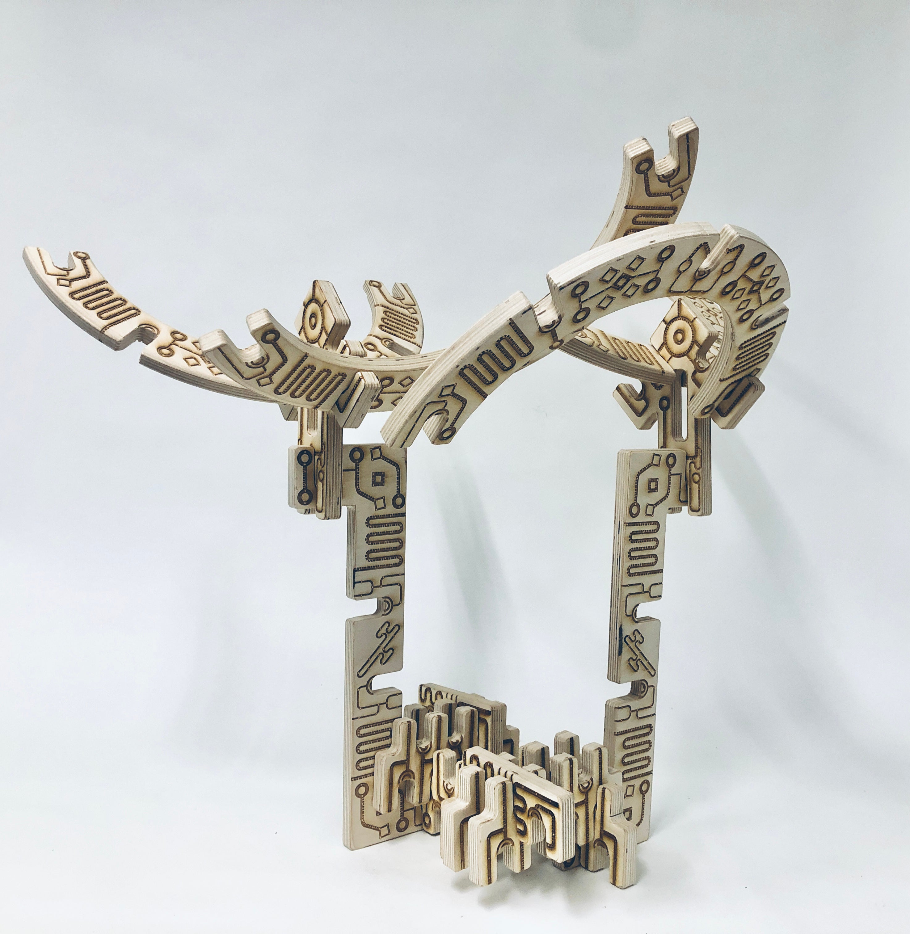 Kole is a building language influenced by the cross culture representation of the African Diaspora. The wooden set is meant to challenge with scale and tactile. 