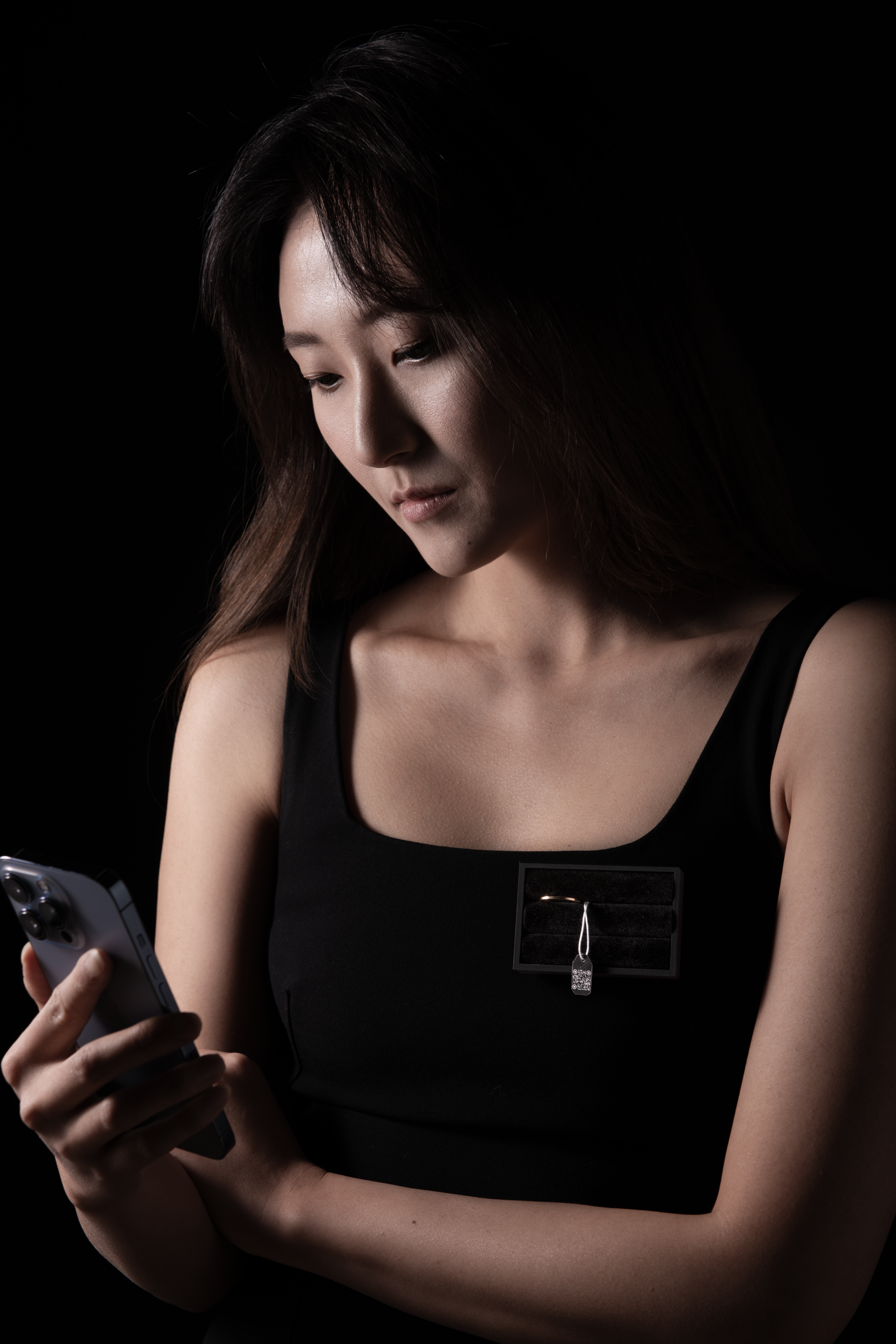 Me as a model, I am holding the phone and wearing one of the brooch with gold ring on it.