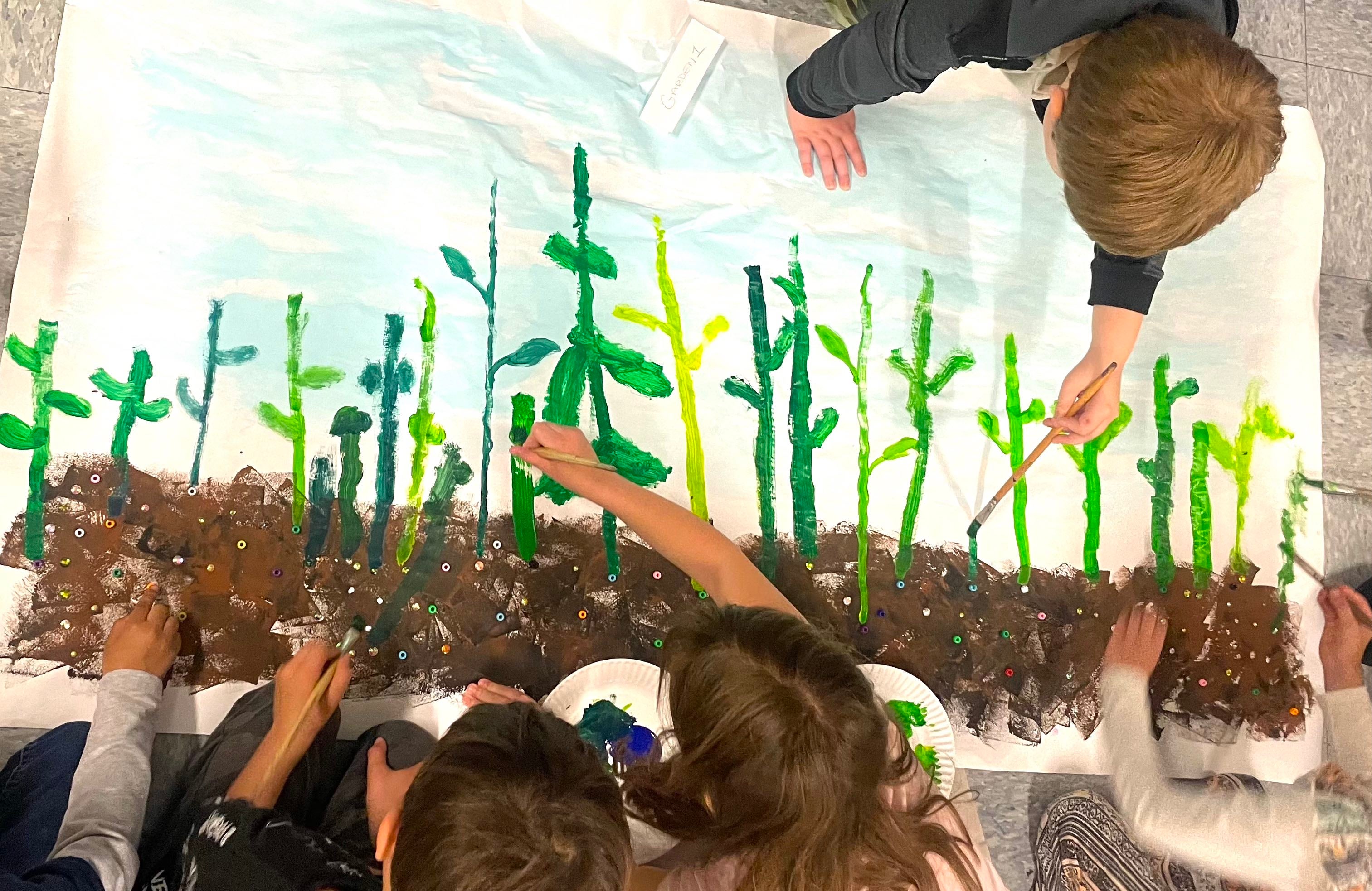 Grade 1, Quidnessett Elementary School “Growing Gardens Mural Project”  Students explore phases of plant life and demonstrate great teamwork!