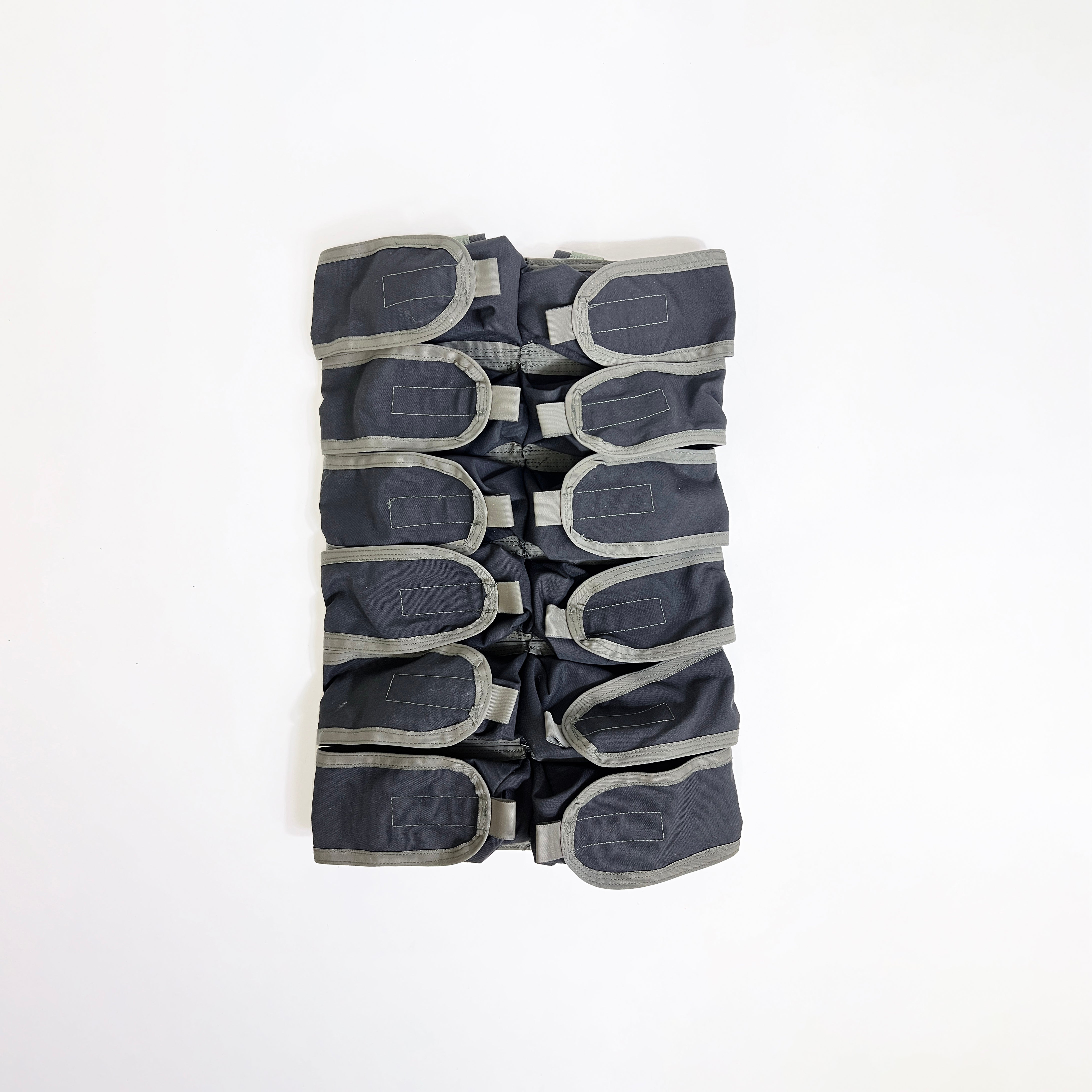 Life can sometimes feel like a battlefield. Running out of sodas during a trip with friends can make people sad. Then there is the Soda Warrior, enabling you to carry 12 sodas for your friends. The Soda Warrior draws inspiration from the Paraclete assault back panel, extracting features like multiple pouches, curved edges, bindings, and side openings. It uses contrasting colors to highlight these elements, enhancing its utility and style.