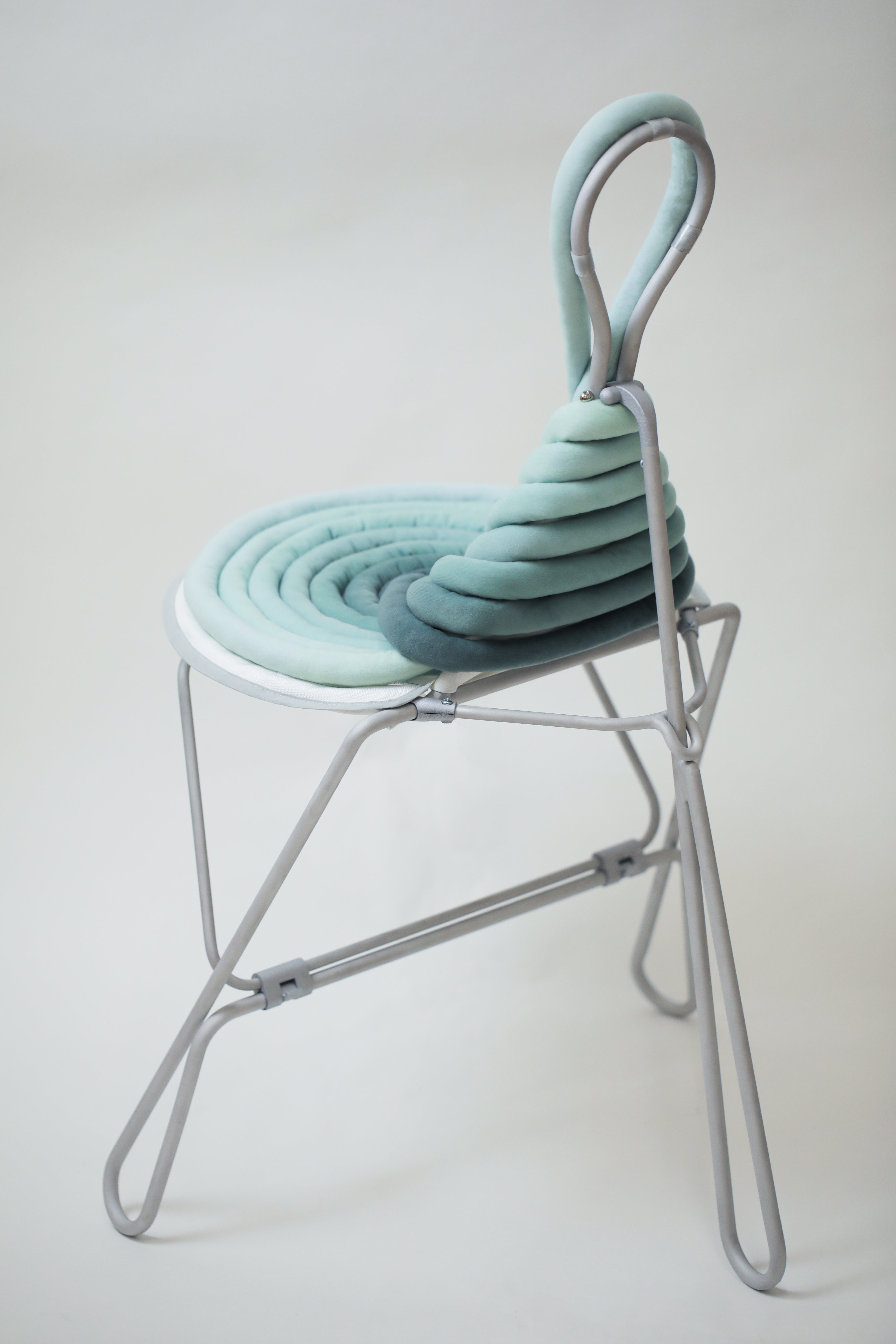 Green knot folding chair back view