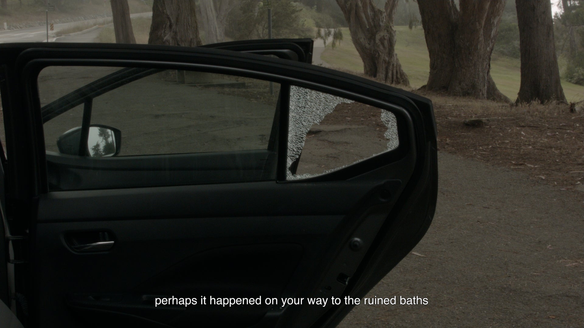 The smashed car window