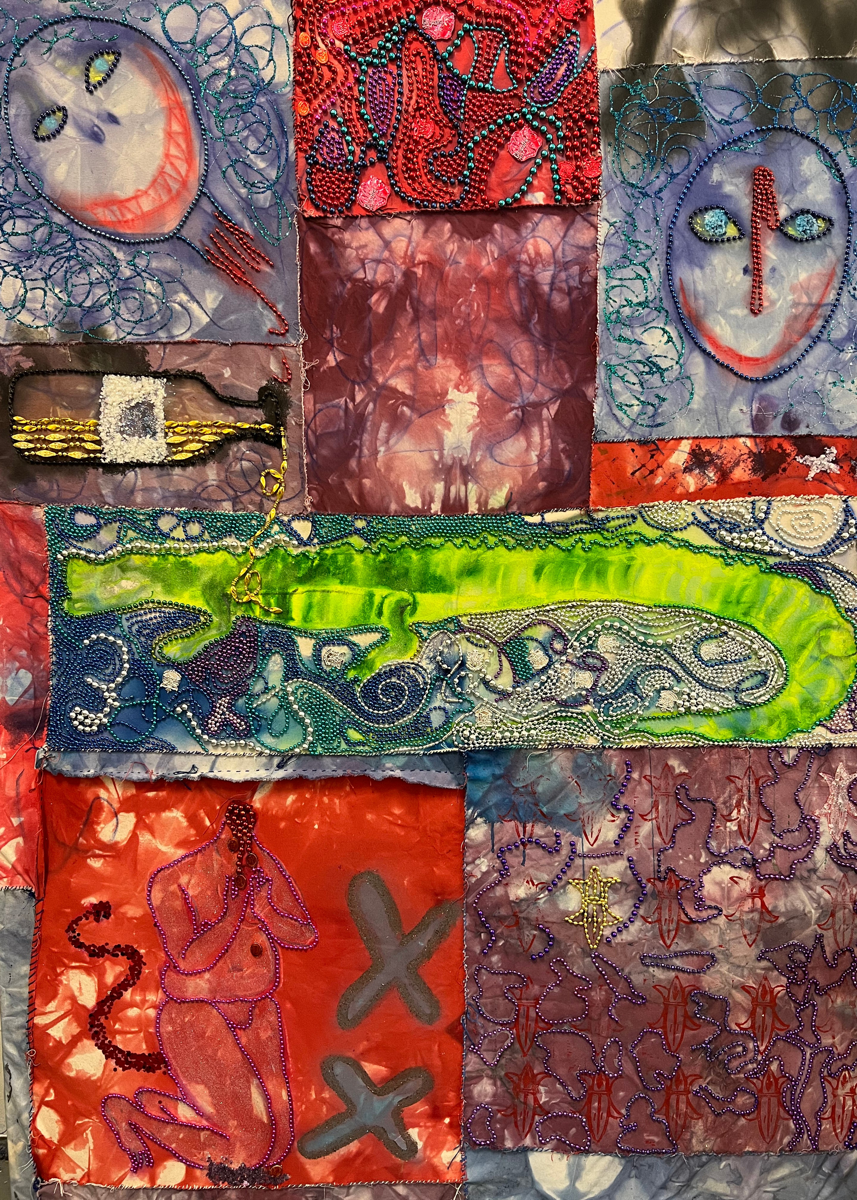 Painting with stitched pieces of dyed fabric and Mardi Gras beads.