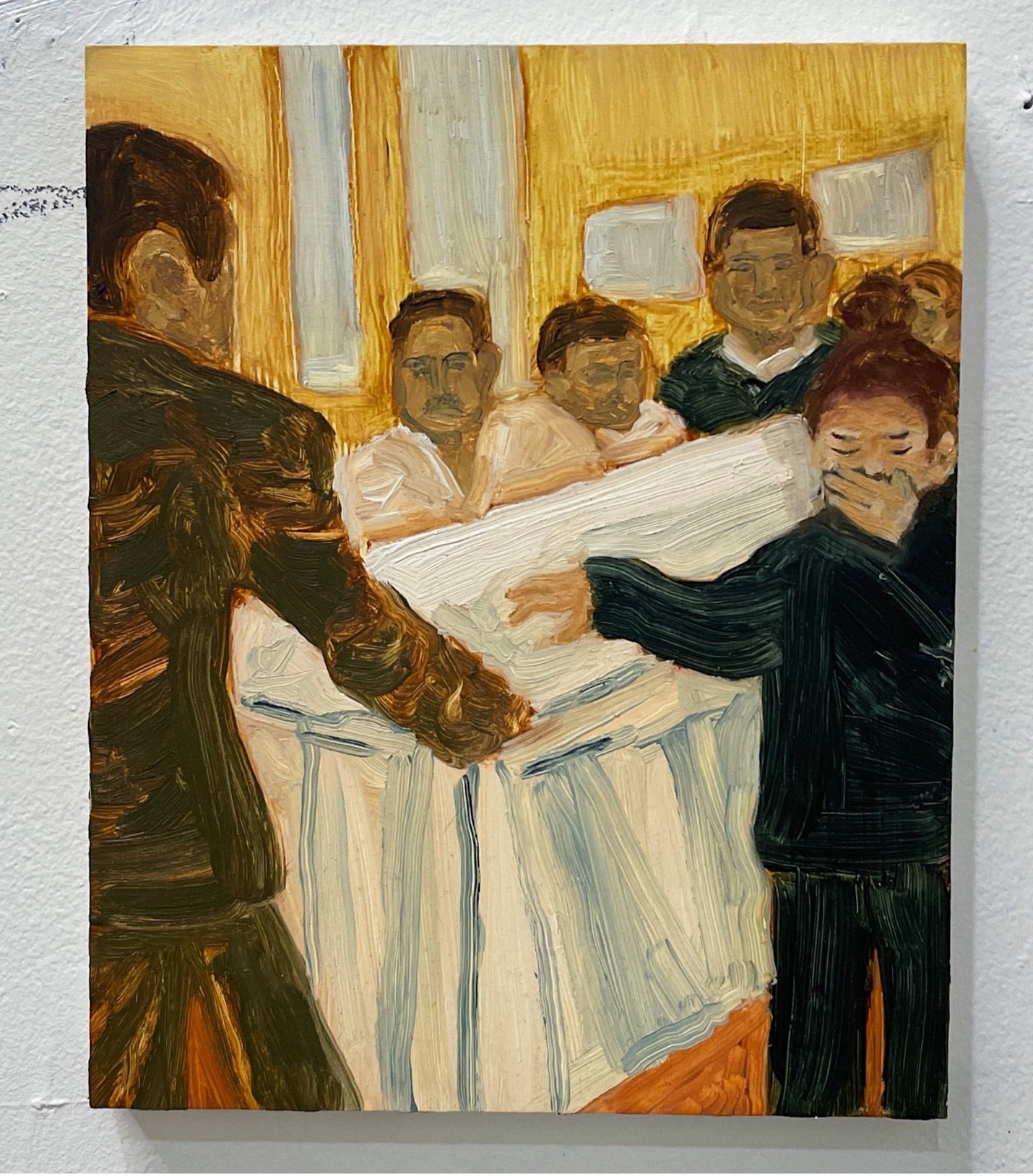 A funeral procession with the family at the side of the casket 