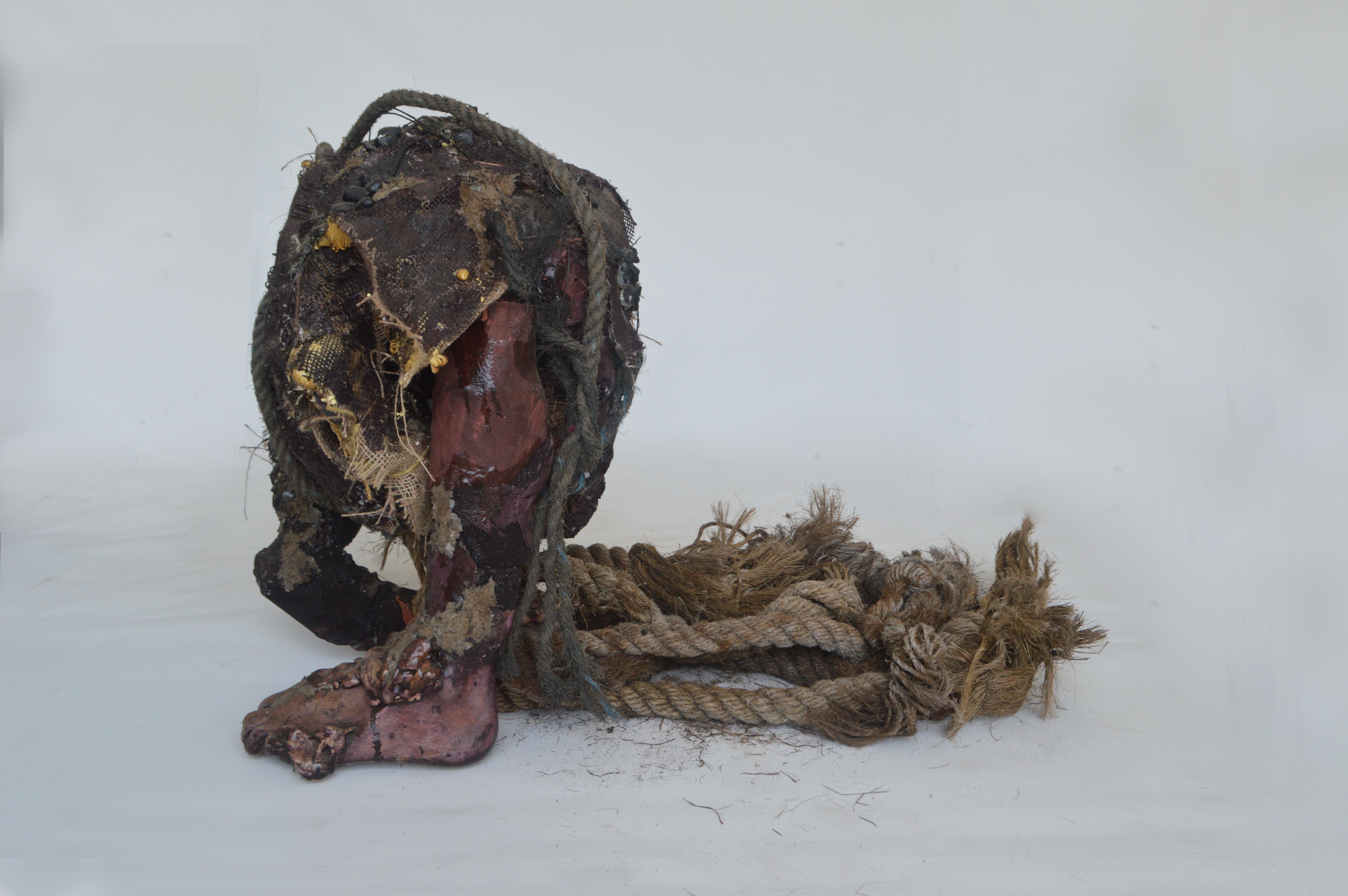 2023. Clay, plaster, rocks, rope, burlap, wire, paper, foam, wood stain.