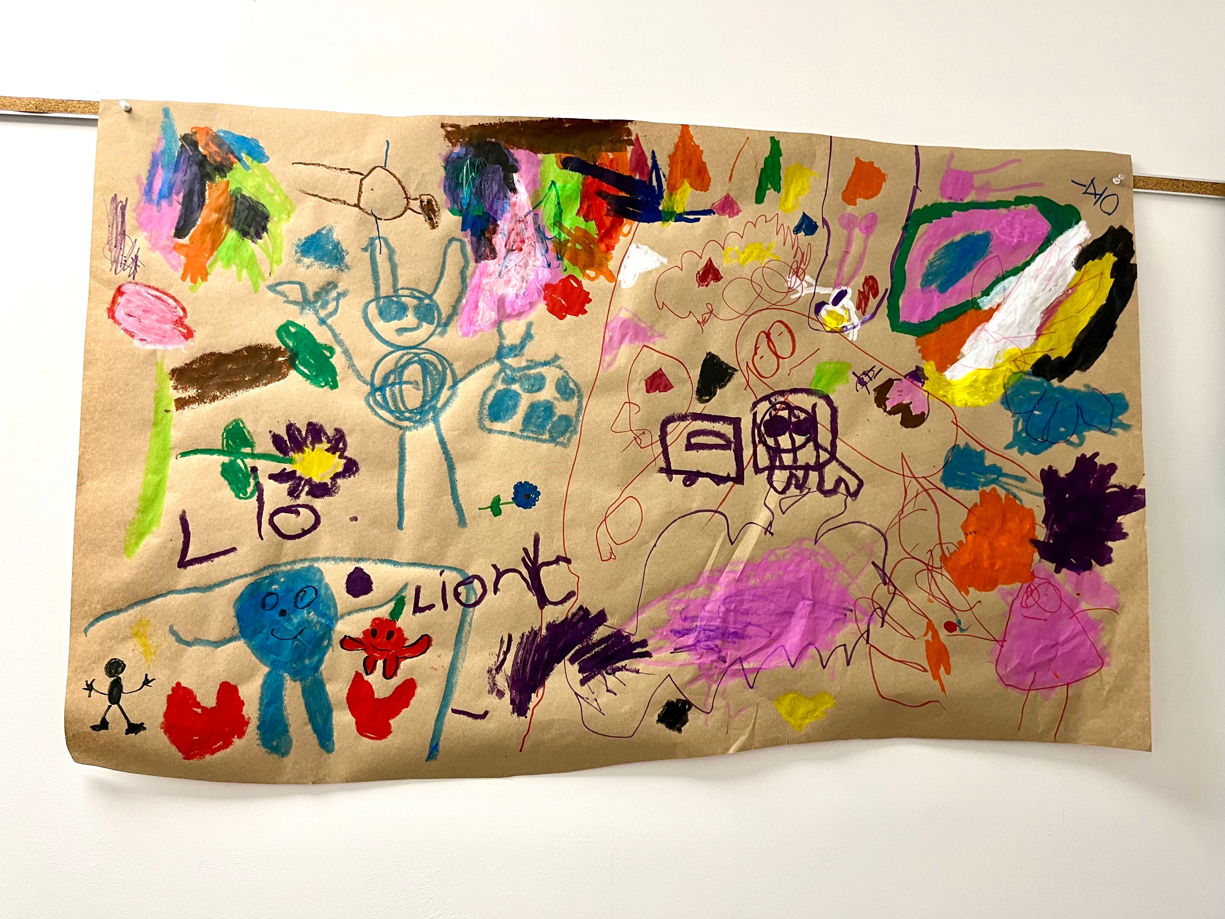 Pre-K students at Colt Andrews Elementary School work collaboratively in exploring Qwik Stiks as a new material. Photographed by Allison Neslund.