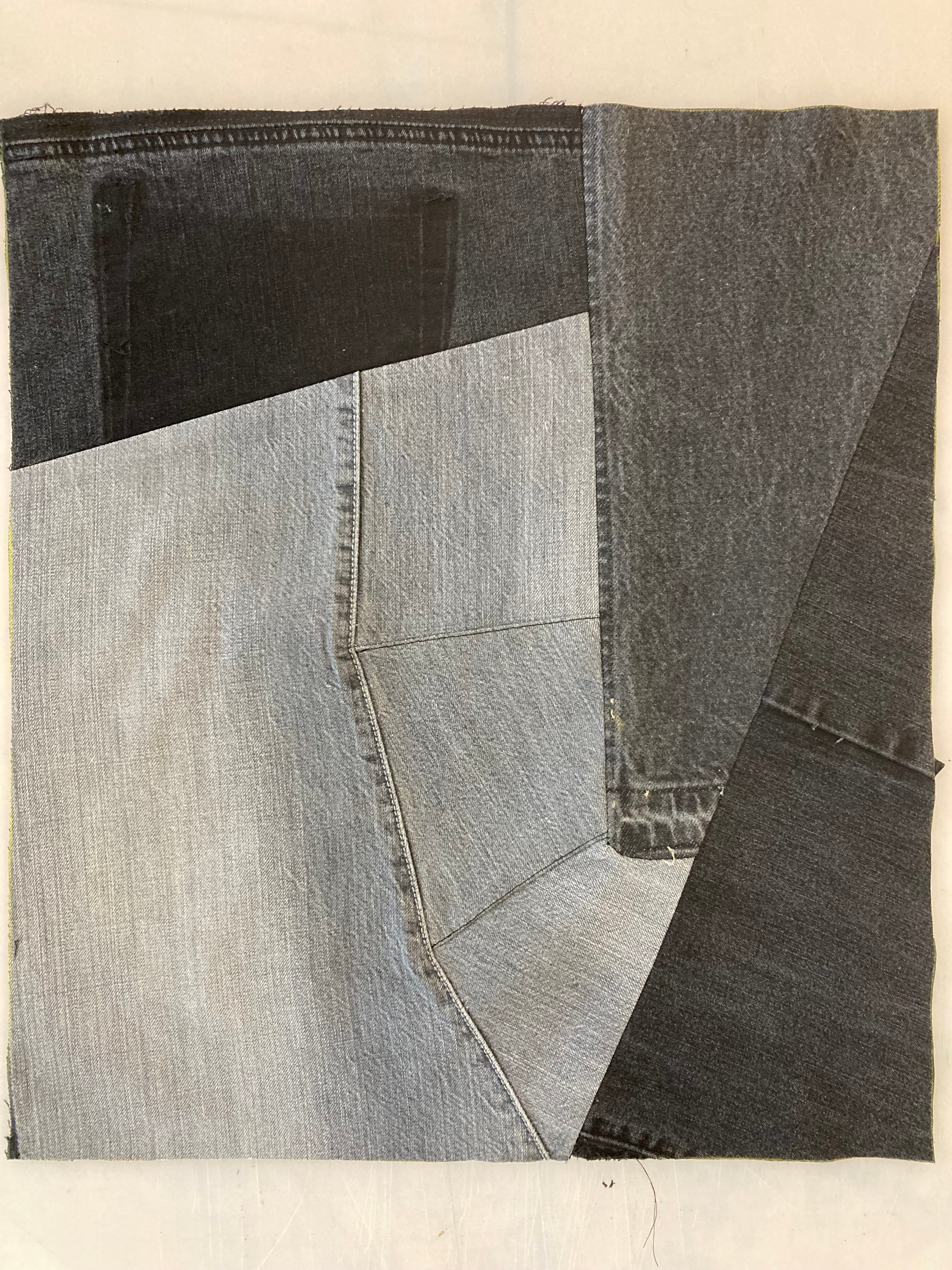 Patchwork of thrifted denim