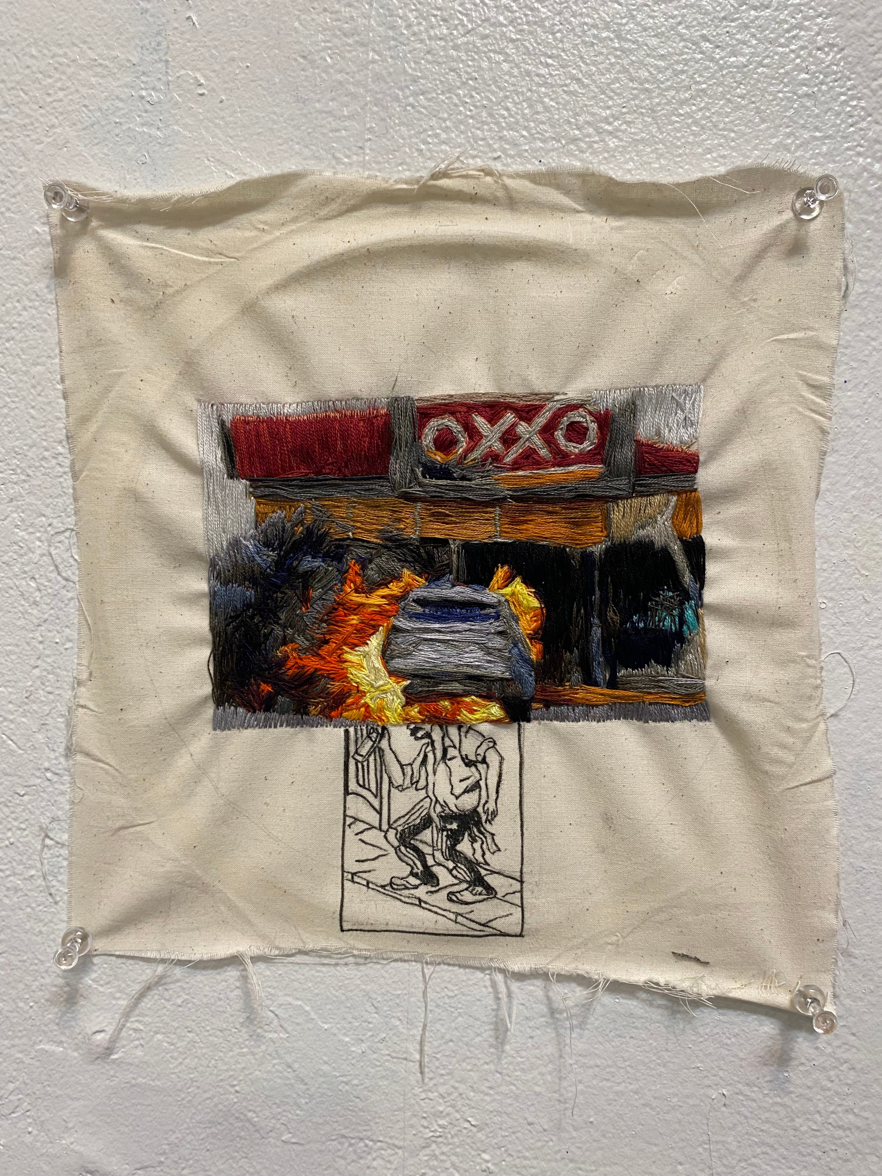 embroidered image of car on fire in front of convenience store