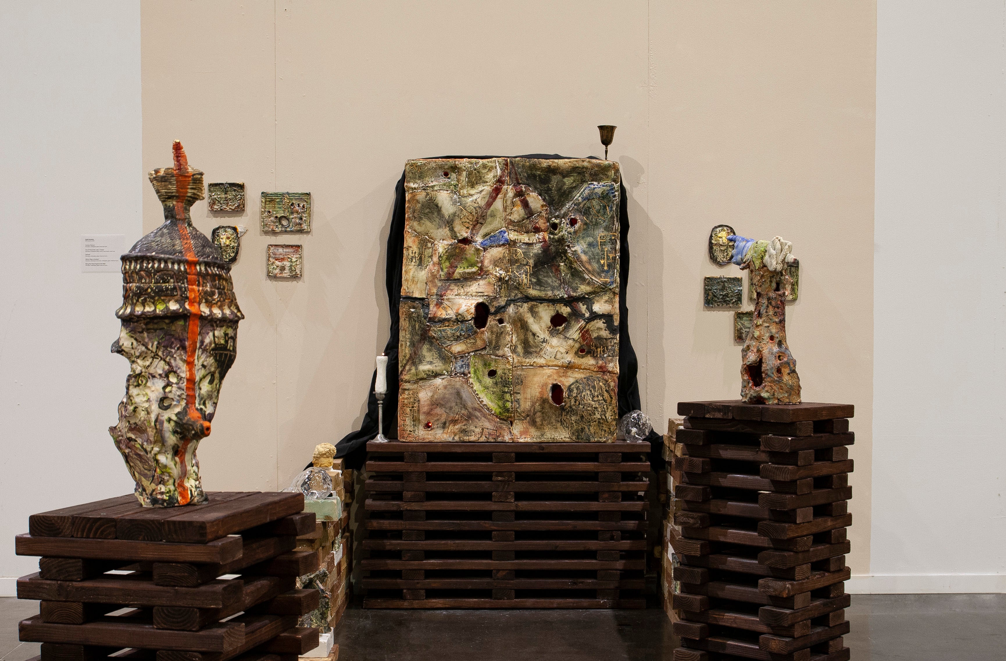 installation of big porcelain box with multiple ceramic objects to the sides
