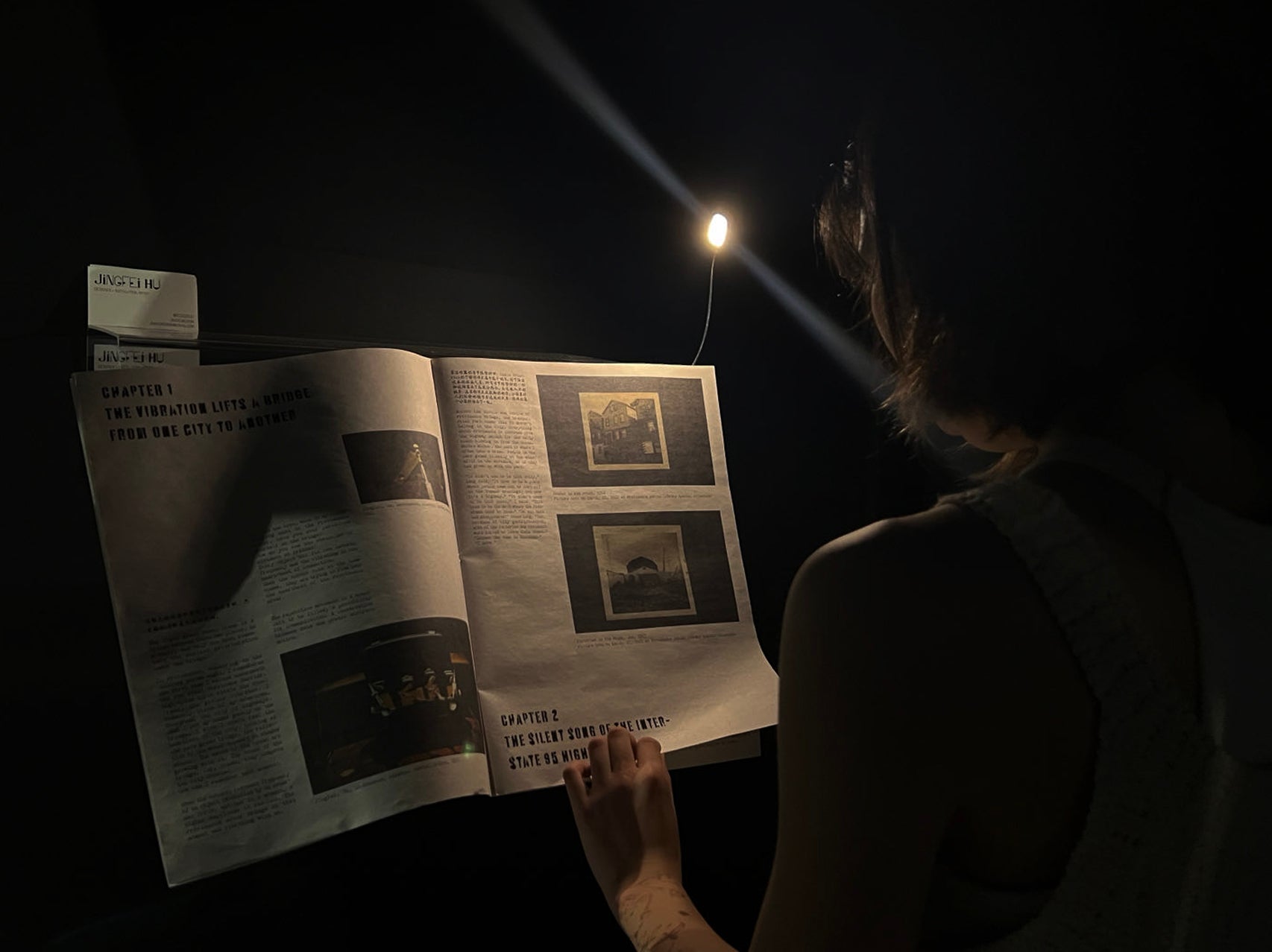 Audience reading the book