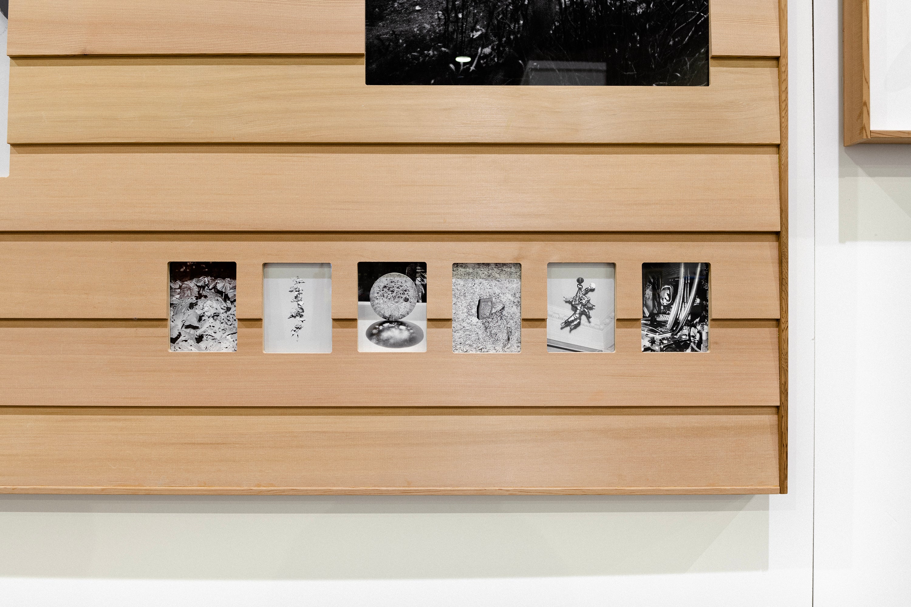 Installation view of framed photographic artworks at the RISD Degree Show 2023