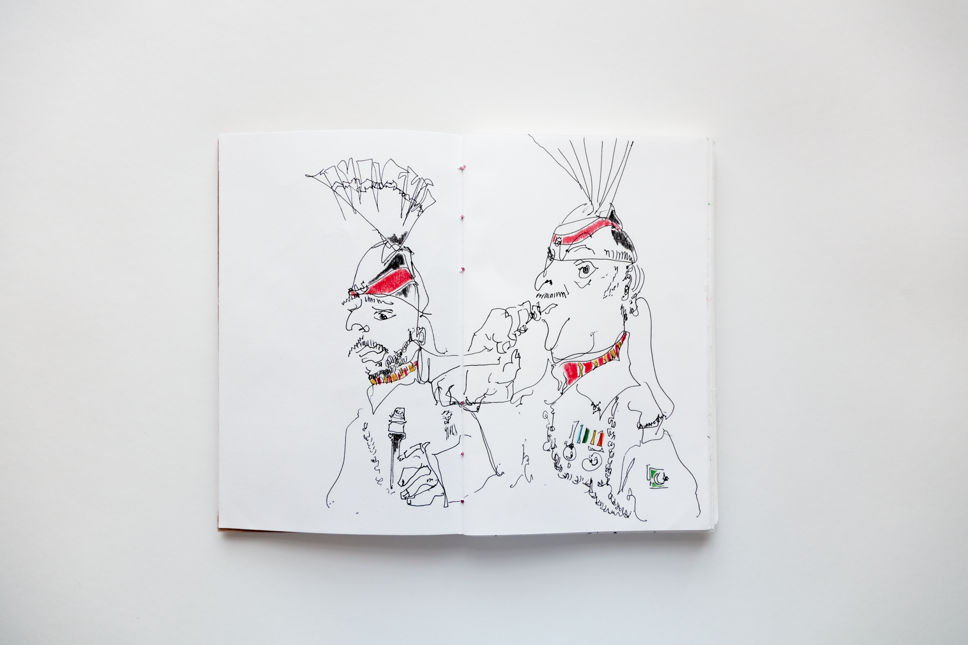 line drawings of soldiers in artist book