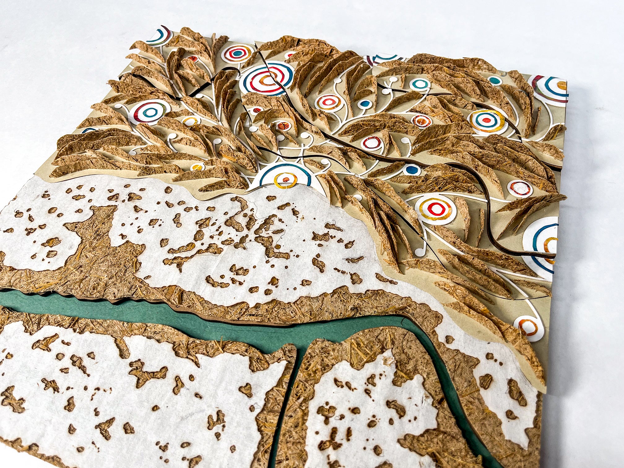 /Hand%20crafted%20landscape%20model%2C%20made%20of%20Phragmite%20paper%2C%20hand%20collage%2C%20chipboard%20and%20burned%20mulberry%20paper