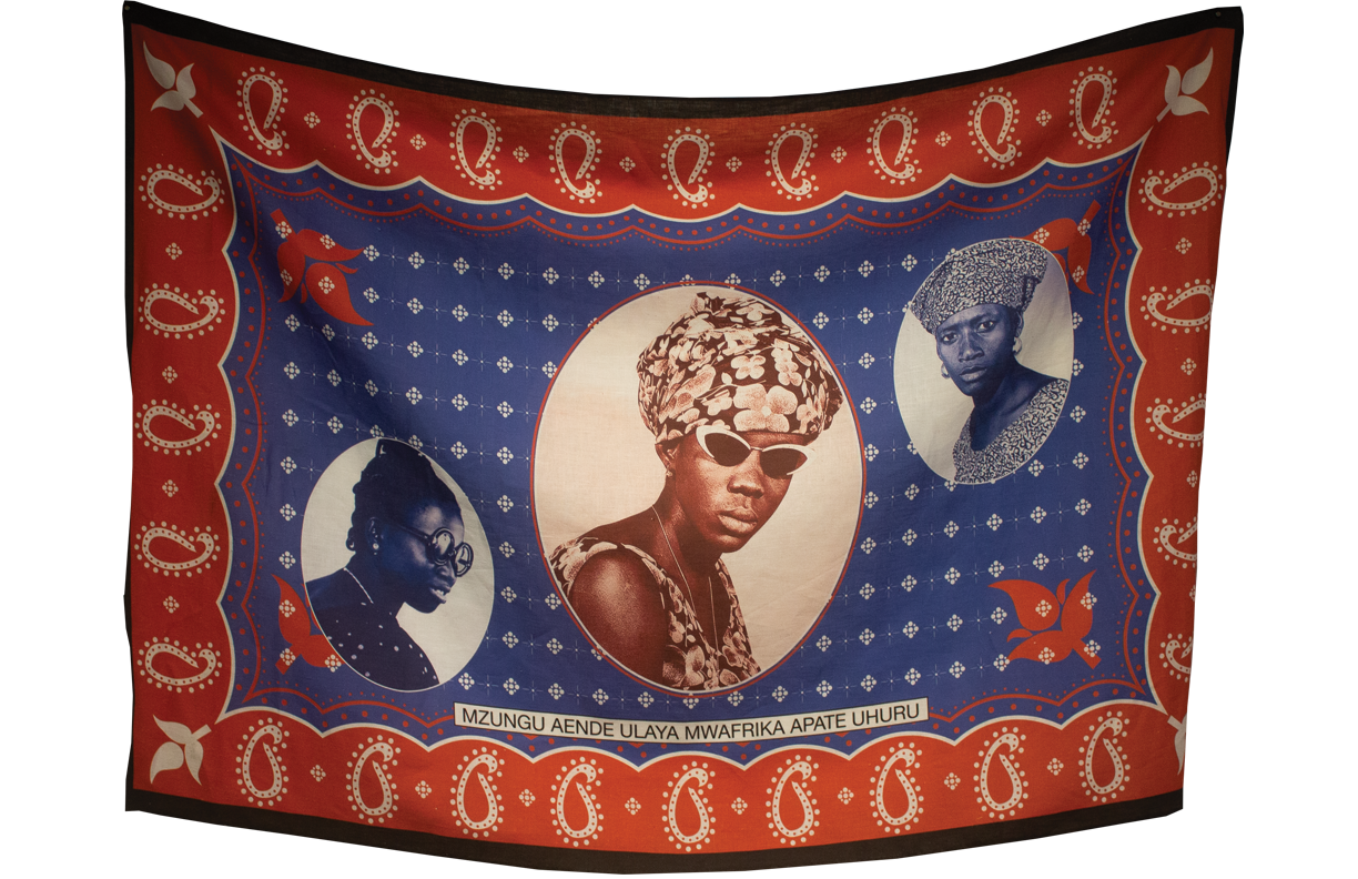 Blue and white imagery on fabric with images of women on it and words towards the bottom in Kiswahili