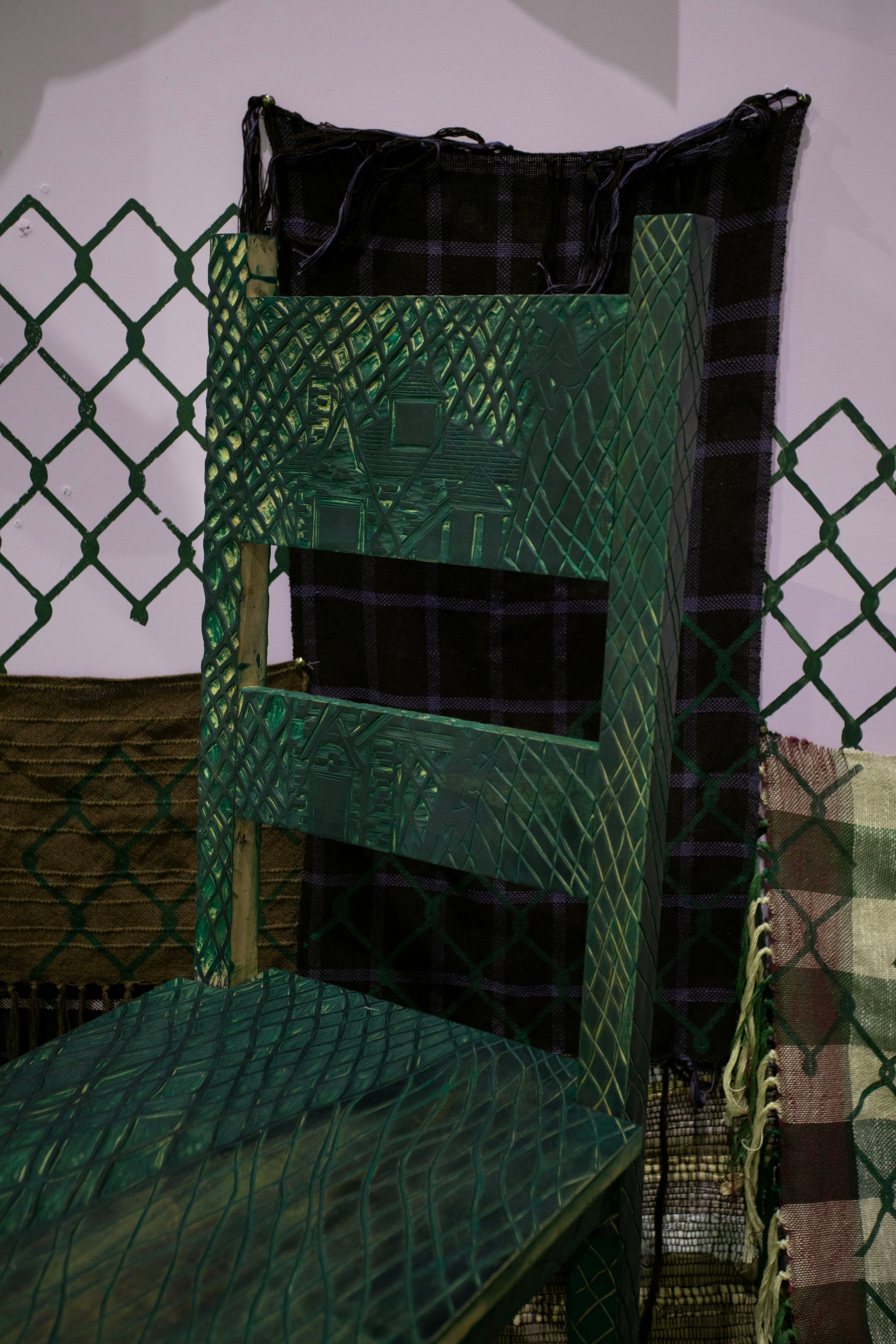 /image%20of%20house%20carved%20into%20a%20chair%20stained%20with%20green%20ink