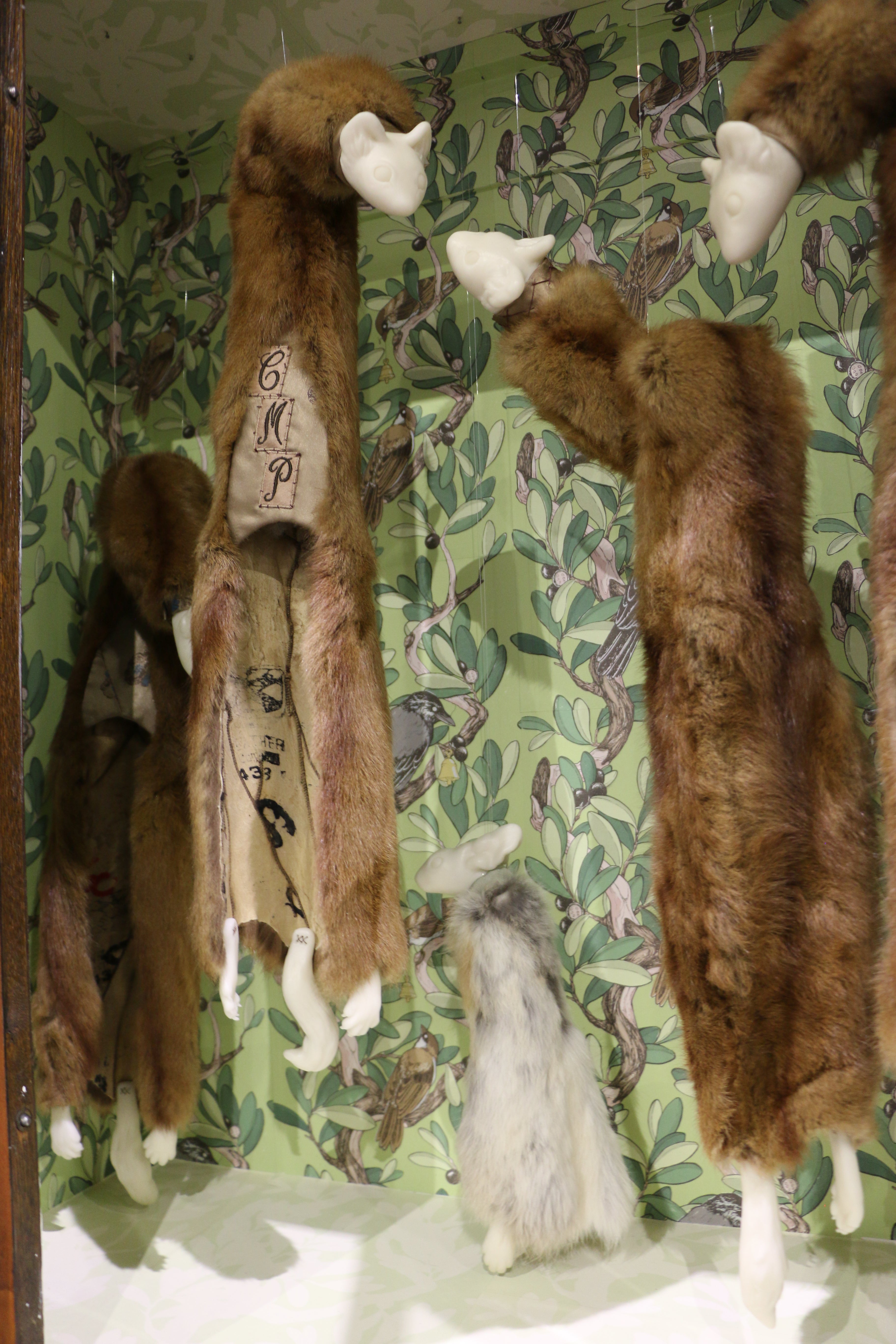 /Minks%20and%20rabbits%20hanging%20inside%20a%20cabinet