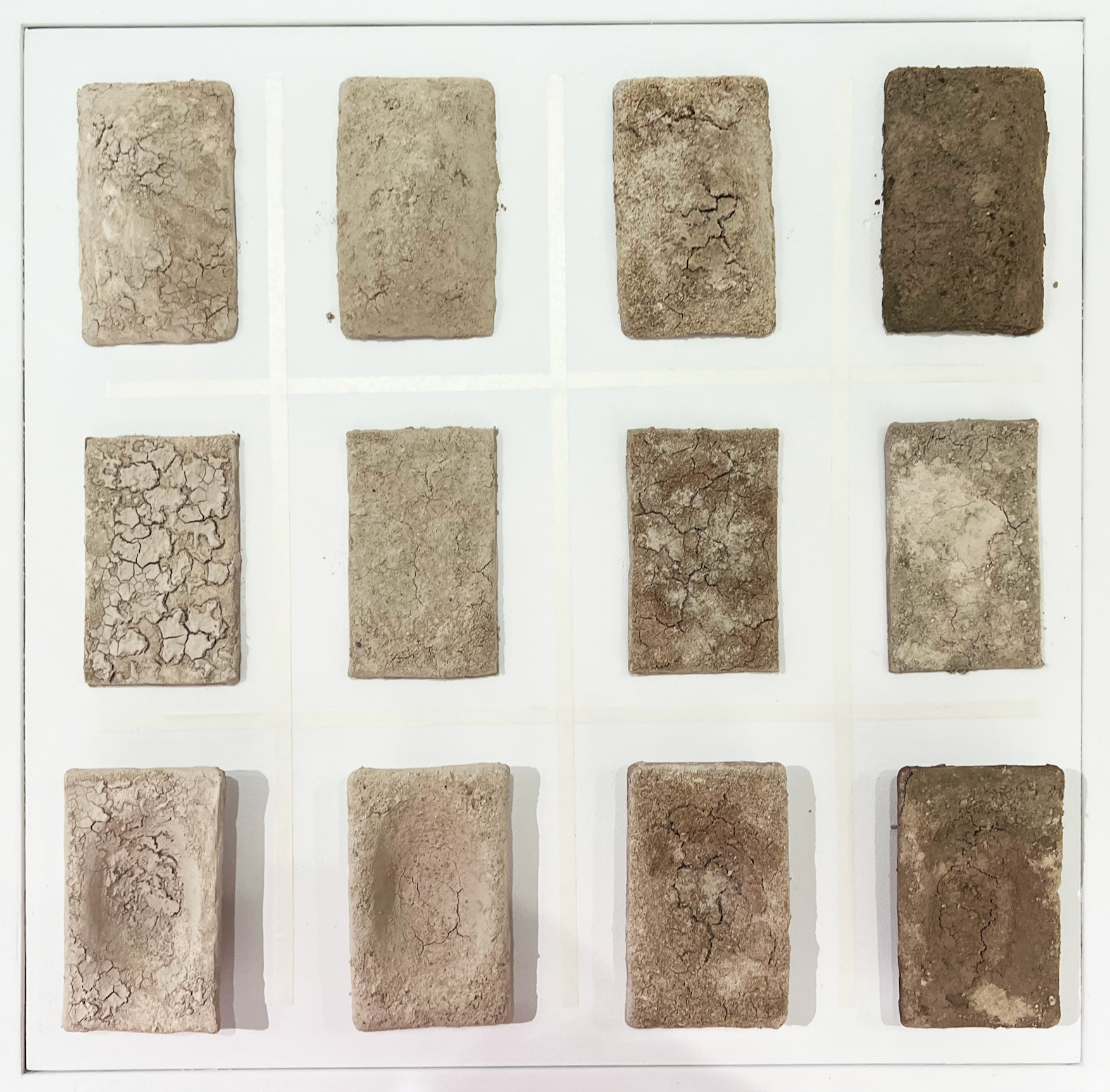 5 x 4 matrix of earthen tiles with varying colors and textures