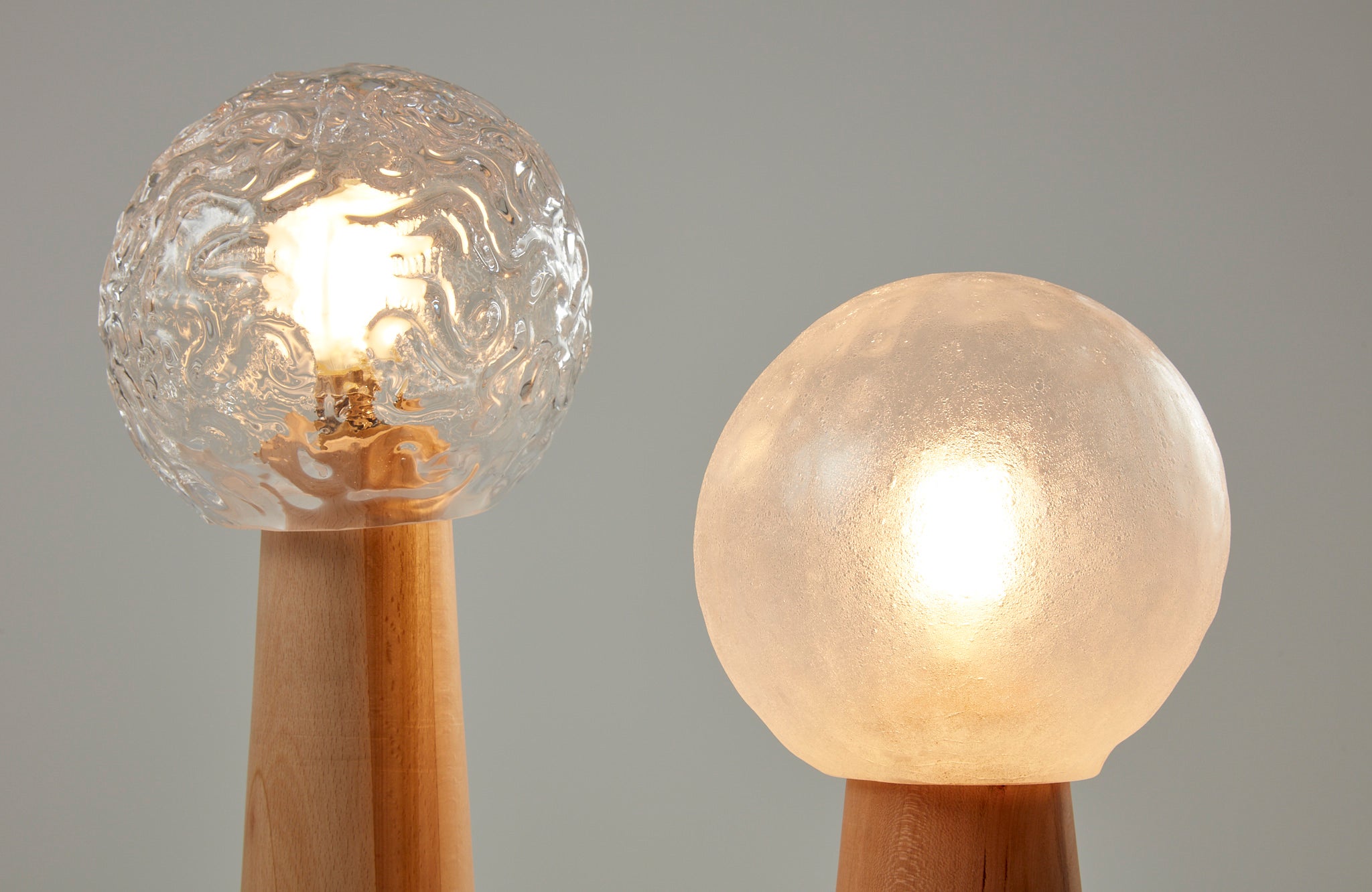 /Detail%20of%20Table%20Lamps%20made%20of%20glassblown%20glass%2C%20beech%2C%20cherry%20and%20lightbulb.