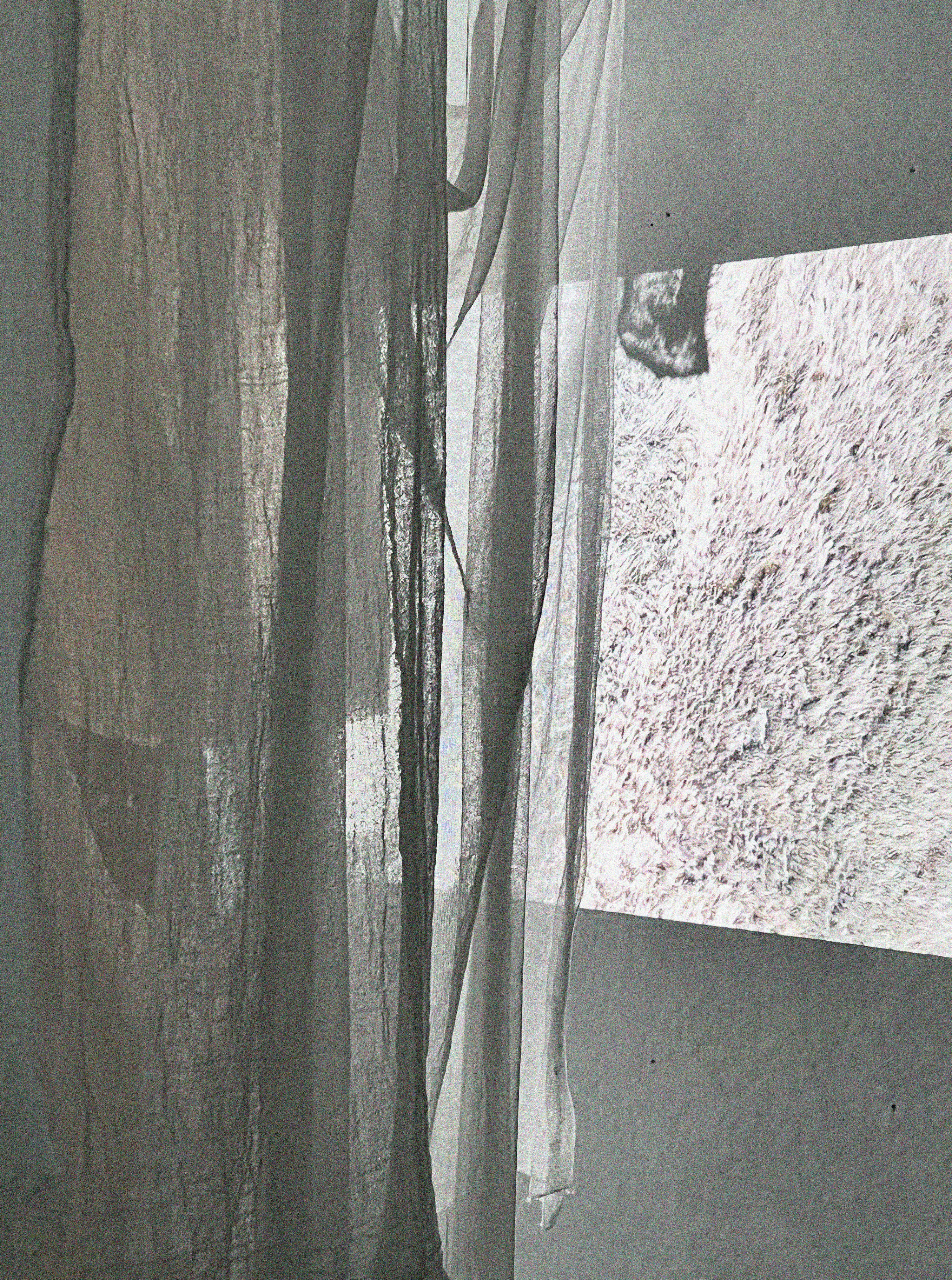 Projection, fabrics hanging, transparencies