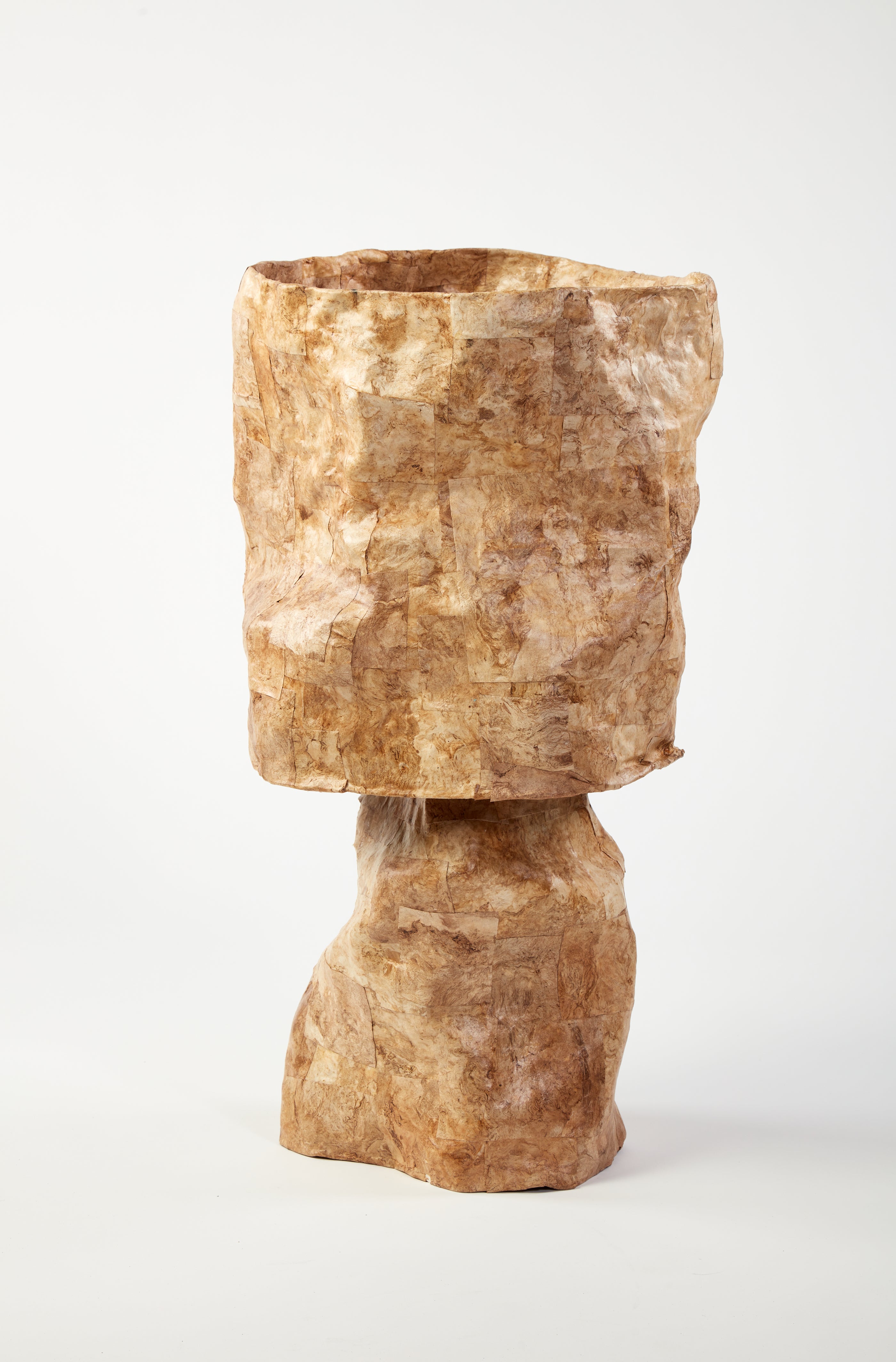 /This%20golden%20hued%20lamp%20is%20made%20of%20paper%20with%20vivd%20swirls%20of%20naural%20fibers%20that%20move%20in%20all%20directions.%20The%20paper%20is%20cut%20into%20squares%20and%20collaged%20on%20the%20lamp%20shade%20and%20base%20in%20assorted%20sizes.