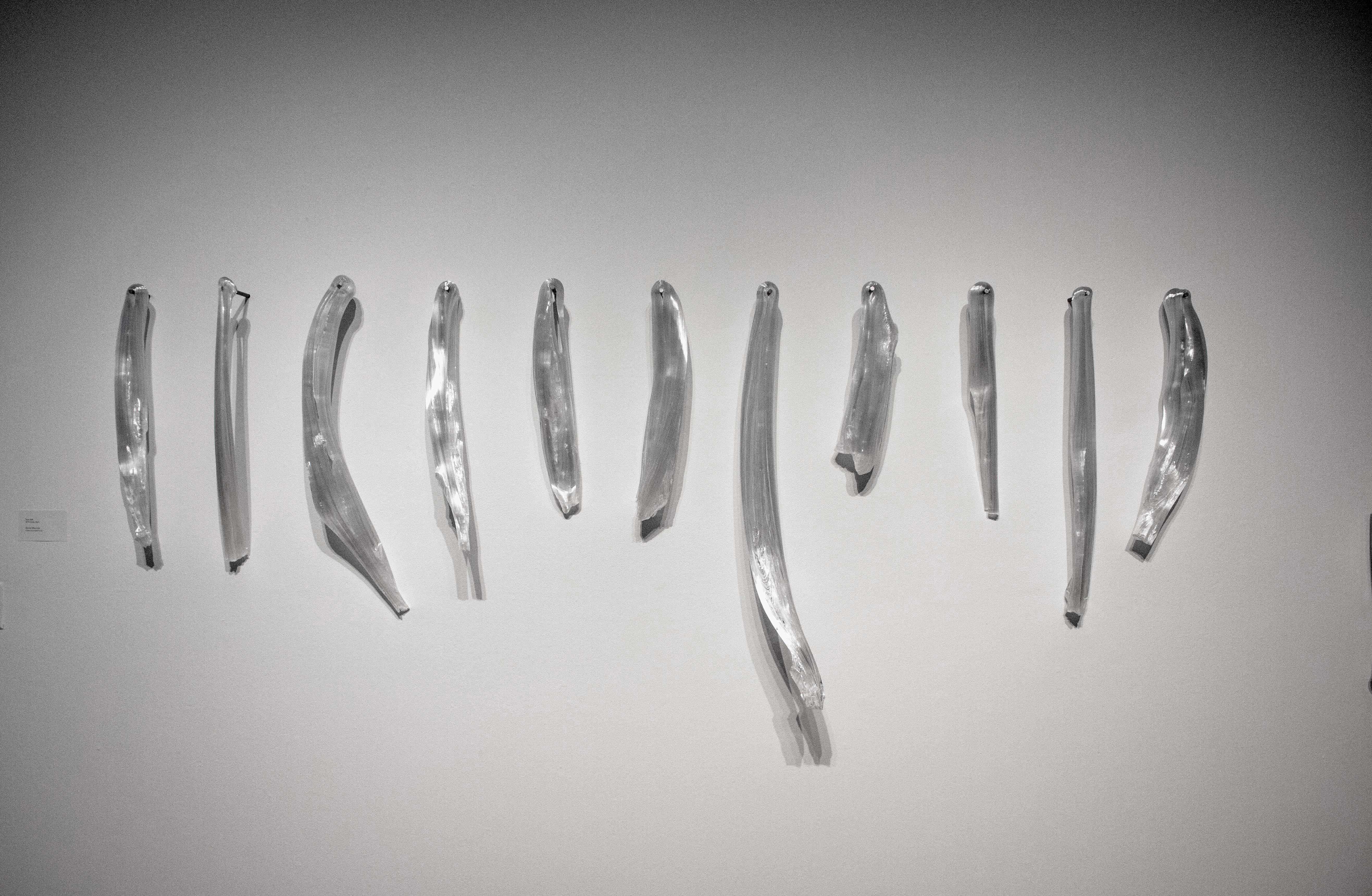 /Bone%20Marrow%2C%20suspended%20on%20steel%20rods%20depict%20the%20action%20of%20strenuous%20pulling.%20It%20challenges%20assumptions%20and%20showcases%20the%20materiality%20of%20glass%2C%20evoking%20questions%20on%20glass%E2%80%99s%20limits%2C%20malleability%20and%20expressive%20potential.