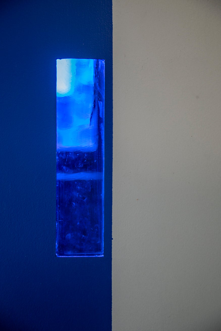 /Blue%20stained%20glass%20integrated%20into%20fabricated%20wall%20acts%20as%20a%20filter%20to%20my%20memory%20realm%2C%20unraveling%20blue%20carpet%20memories.