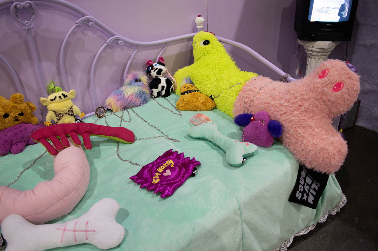 /Photograph%20of%20toys%20on%20a%20bed.