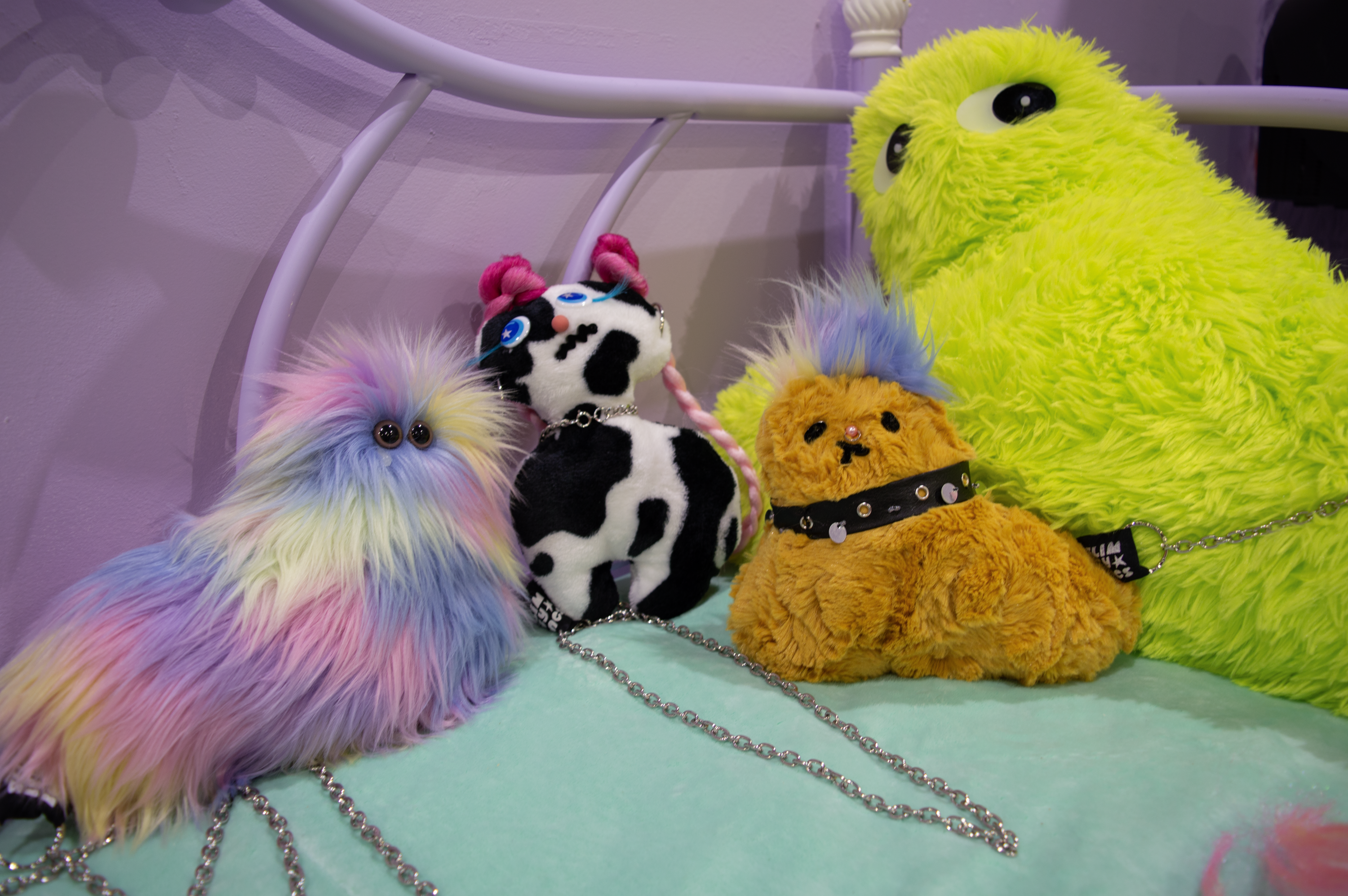/Detail%20photograph%20of%20toys%2C%20ranging%20from%20cute%20to%20sad%20to%20unsettling.